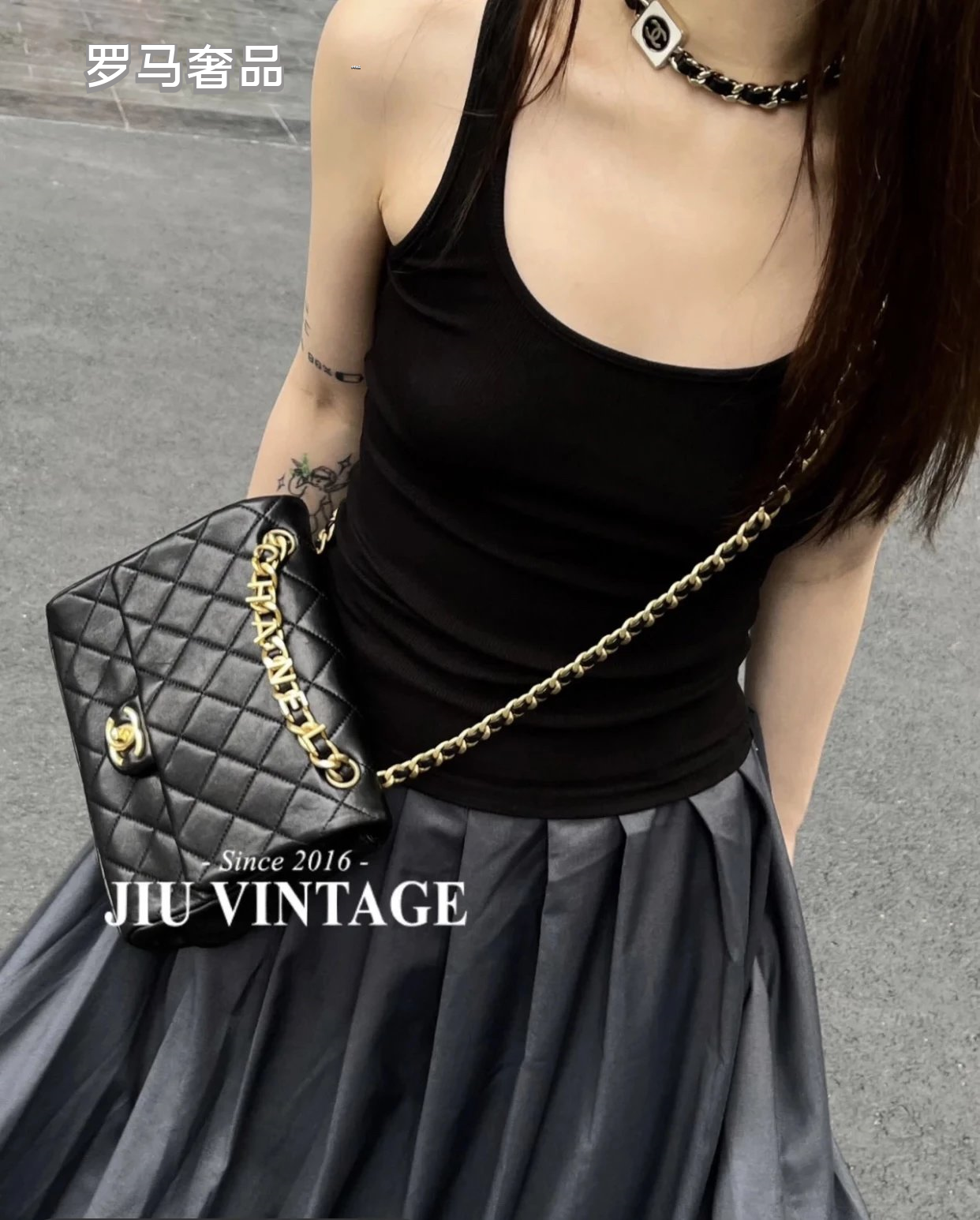 Chanel Black Quilted Lambskin Flap Bag with Gold-Tone Logo Chain