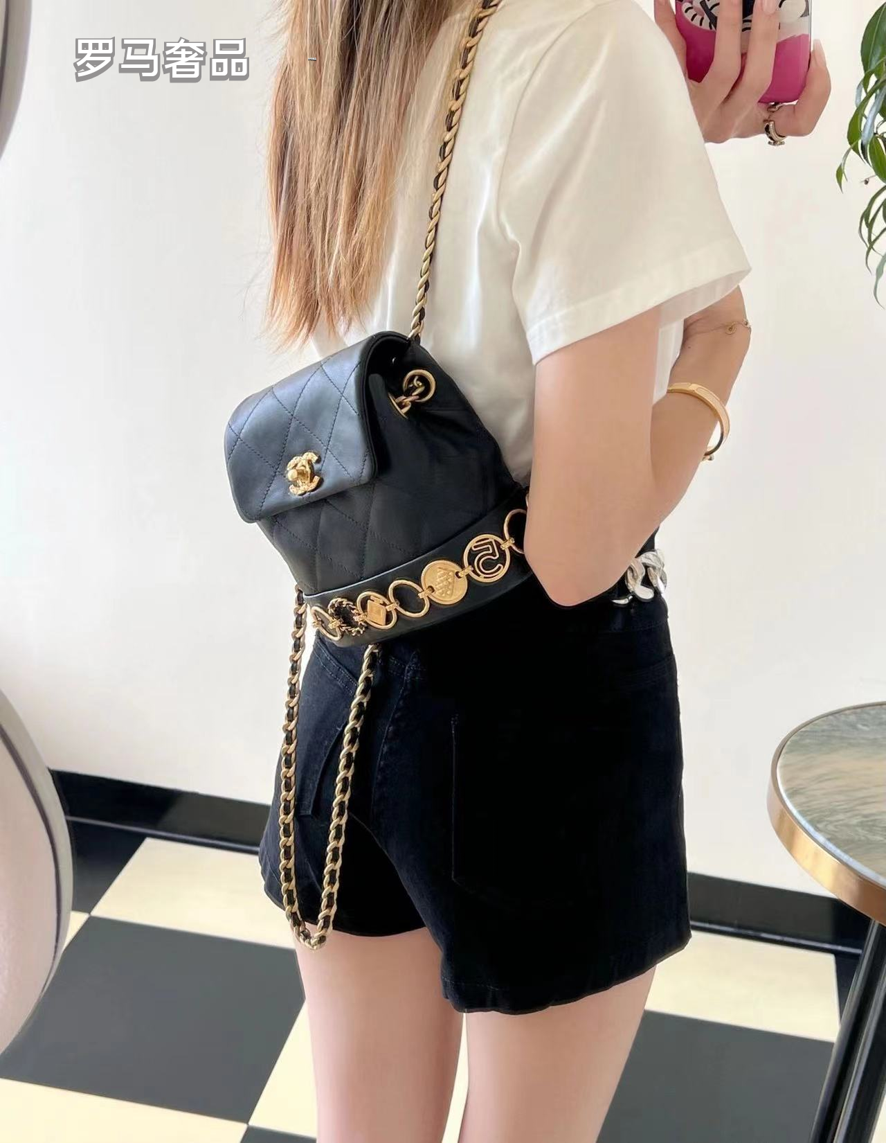 Chanel Vintage Mini Quilted Leather Backpack with Medallion Charm Chain Detail - Black/Gold