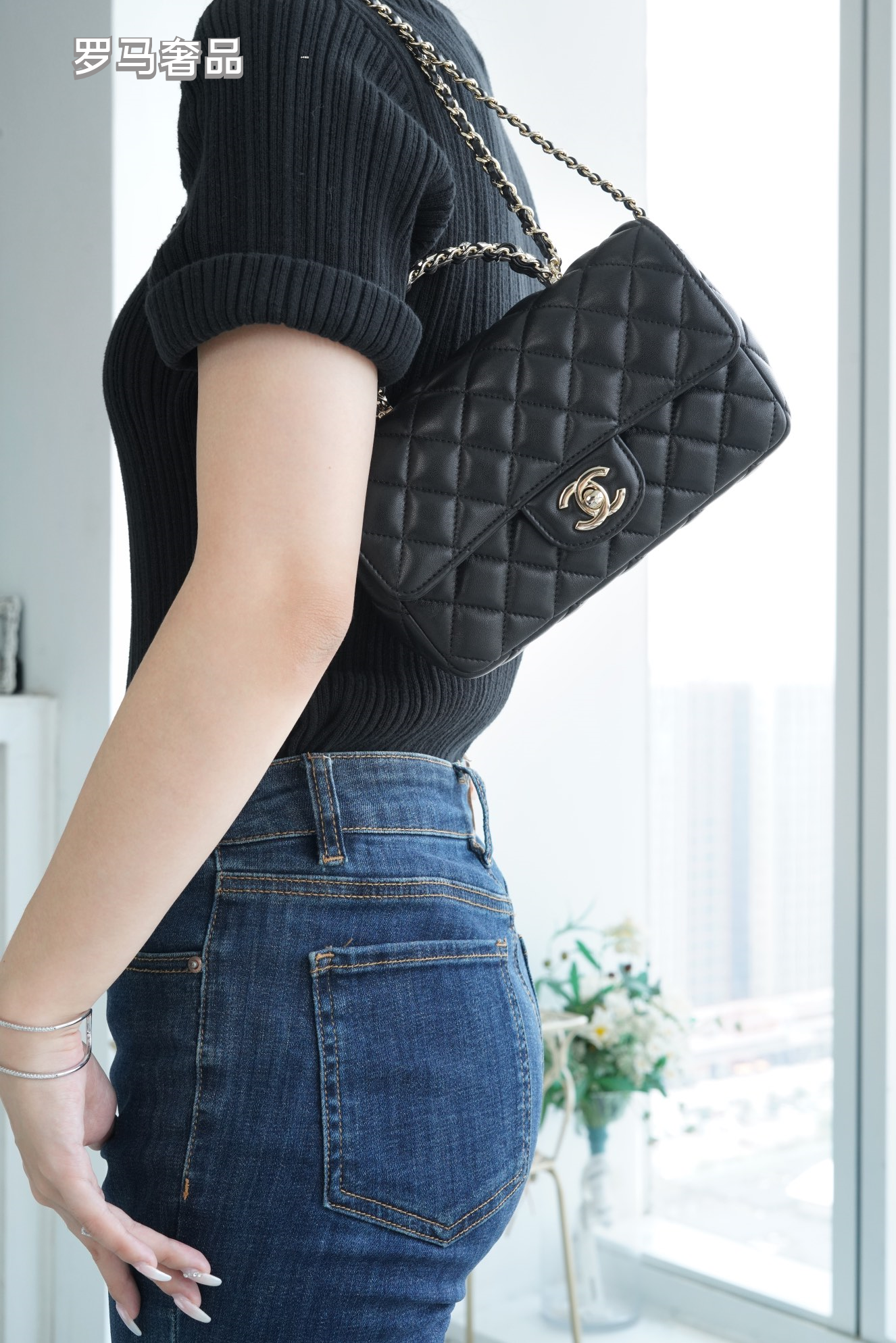 Elegant Black Quilted Leather Top Handle Flap Bag with Silver-Tone Chain
