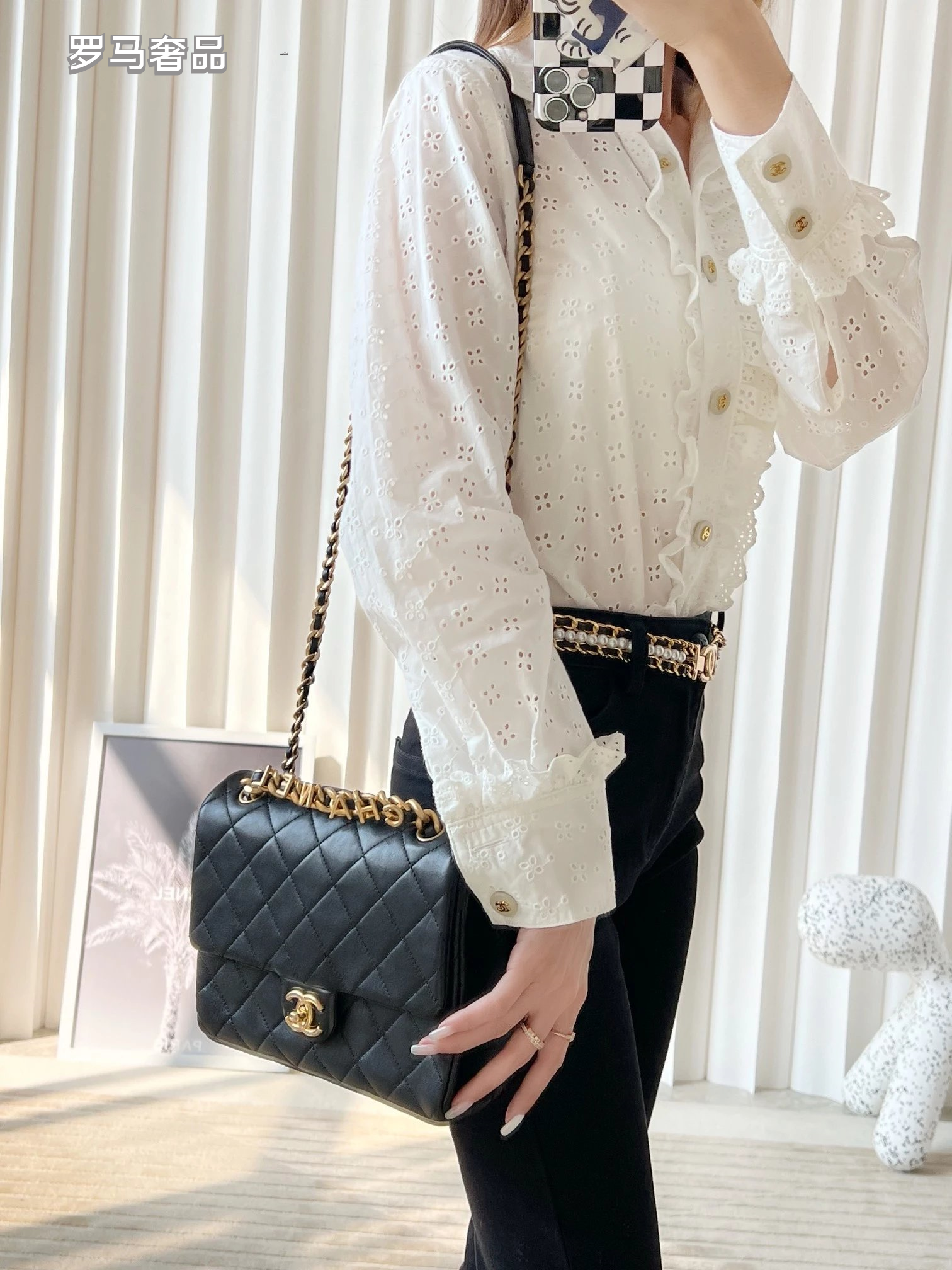Chanel Black Quilted Lambskin Flap Bag with Gold-Tone Logo Chain