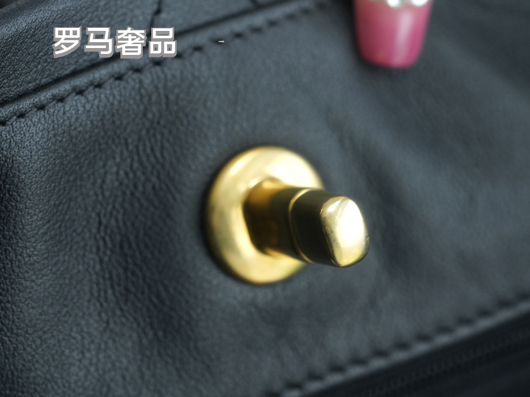 Chanel Quilted Caviar Leather Small Bucket Bag with Gold-Tone Hardware - Black