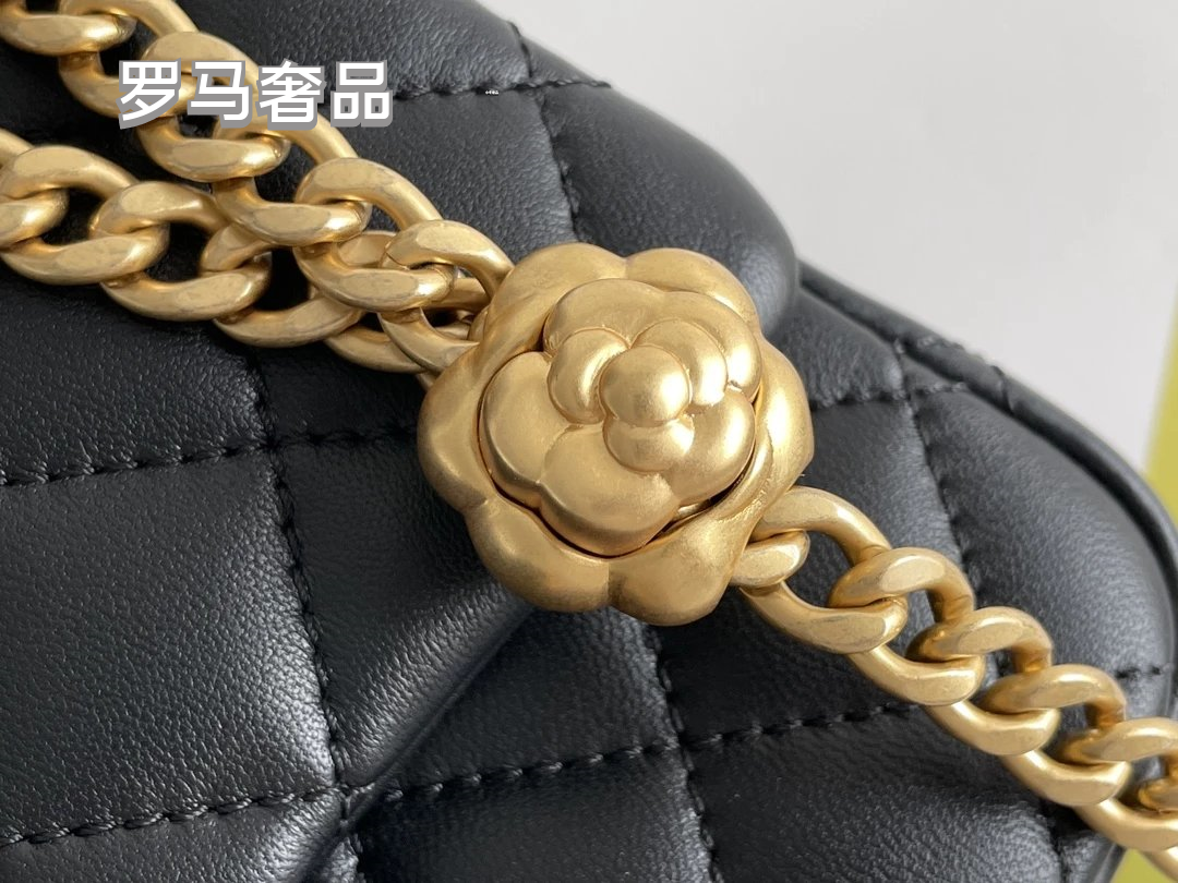 Black Quilted Leather Mini Flap Bag with Gold-Tone Chain and Camellia Charm