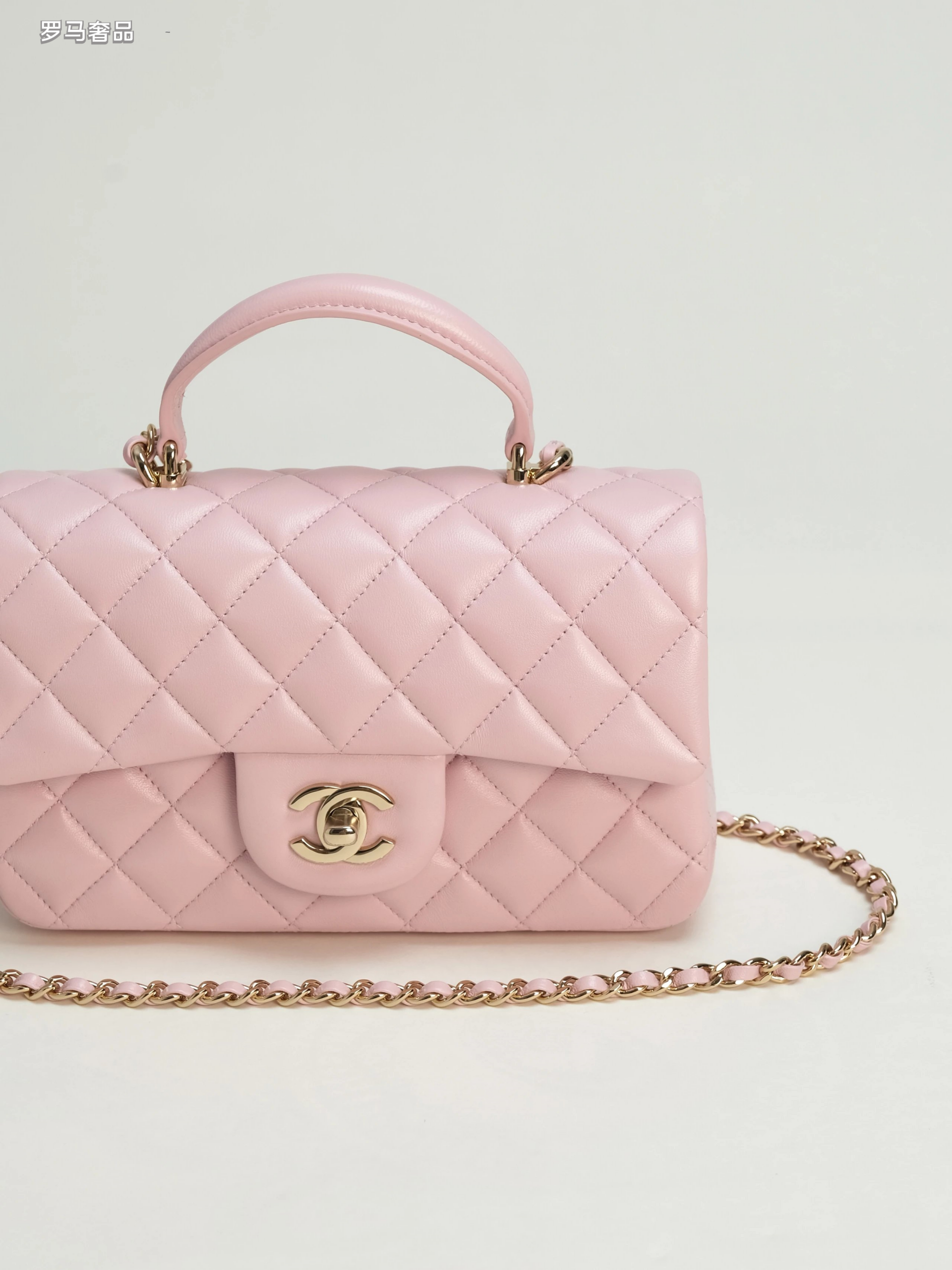 Pink Quilted Top Handle Handbag with Gold-Tone Chain Strap