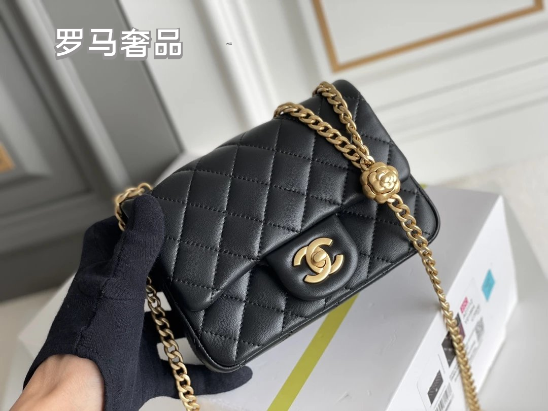 Black Quilted Leather Mini Flap Bag with Gold-Tone Chain and Camellia Charm