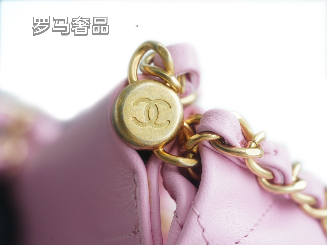 Pink Quilted Leather Bucket Bag with Gold-Tone Chain and Decorative Charms