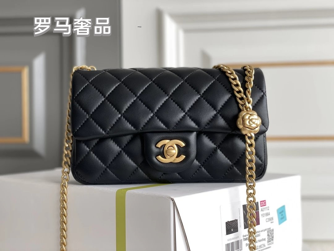 Black Quilted Leather Mini Flap Bag with Gold-Tone Chain and Camellia Charm