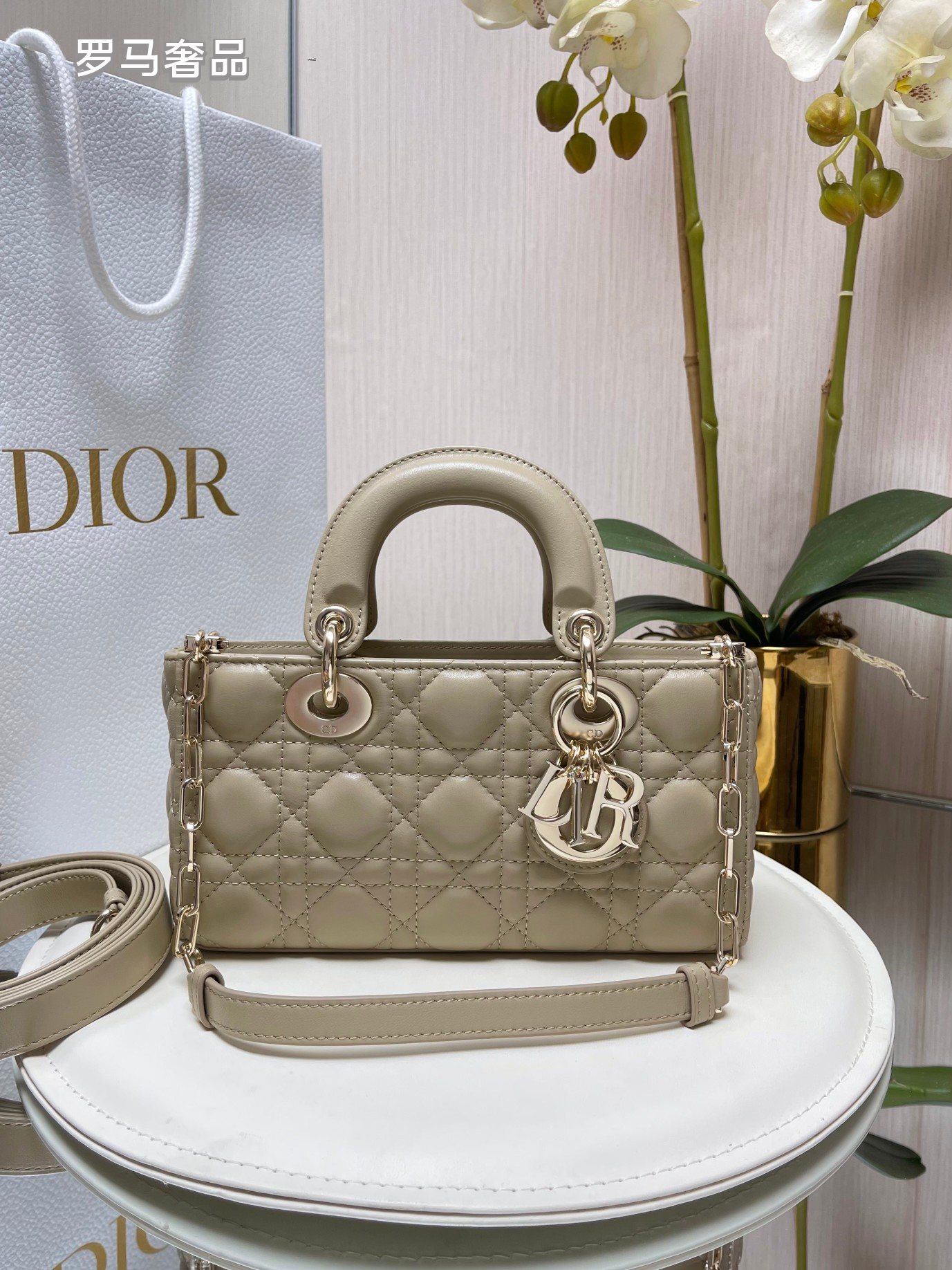Dior Black Quilted Leather Handbag with Top Handle and Gold Chain Strap