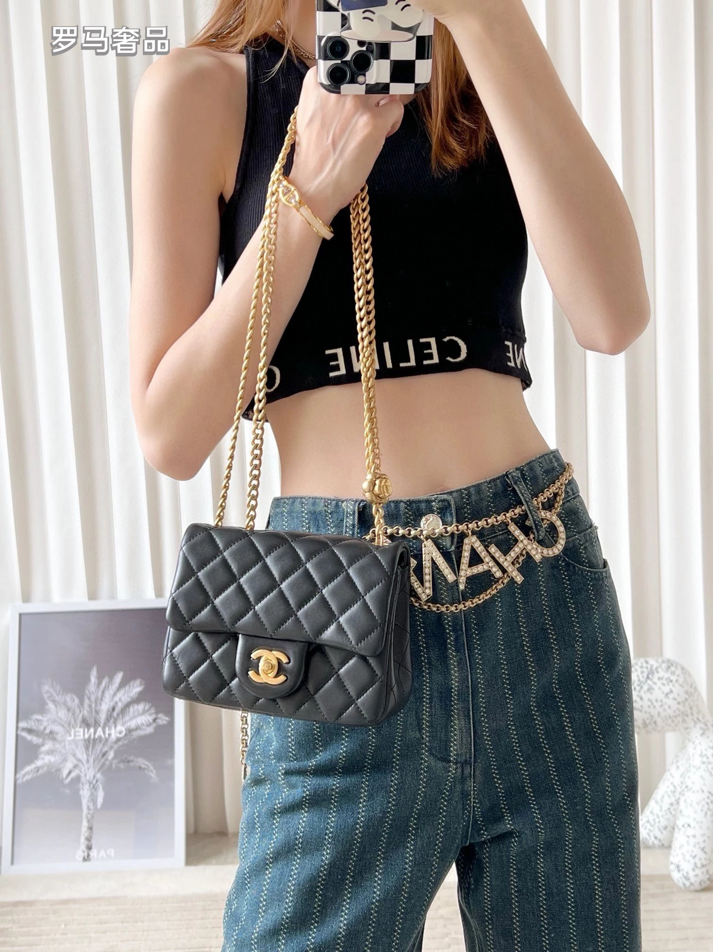 Black Quilted Leather Mini Flap Bag with Gold-Tone Chain and Camellia Charm