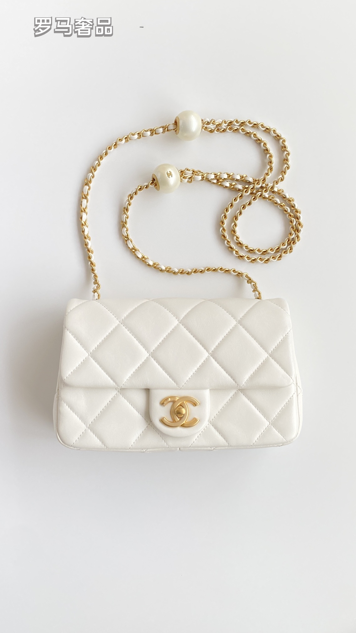 Chanel Quilted Lambskin Mini Flap Bag with Pearl Crush Chain - Black Gold Hardware