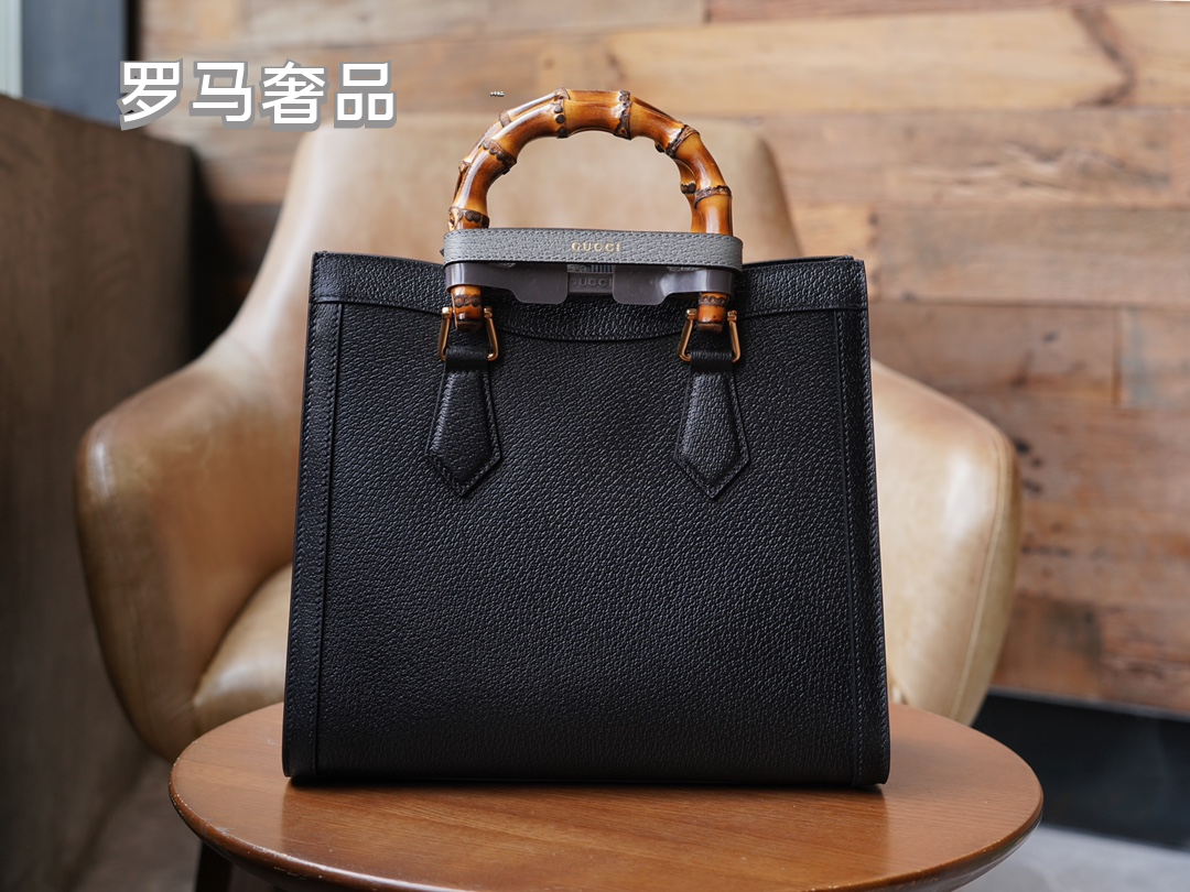 Gucci Elegant Off-White Leather Tote Bag with Bamboo Handles and Web Strap
