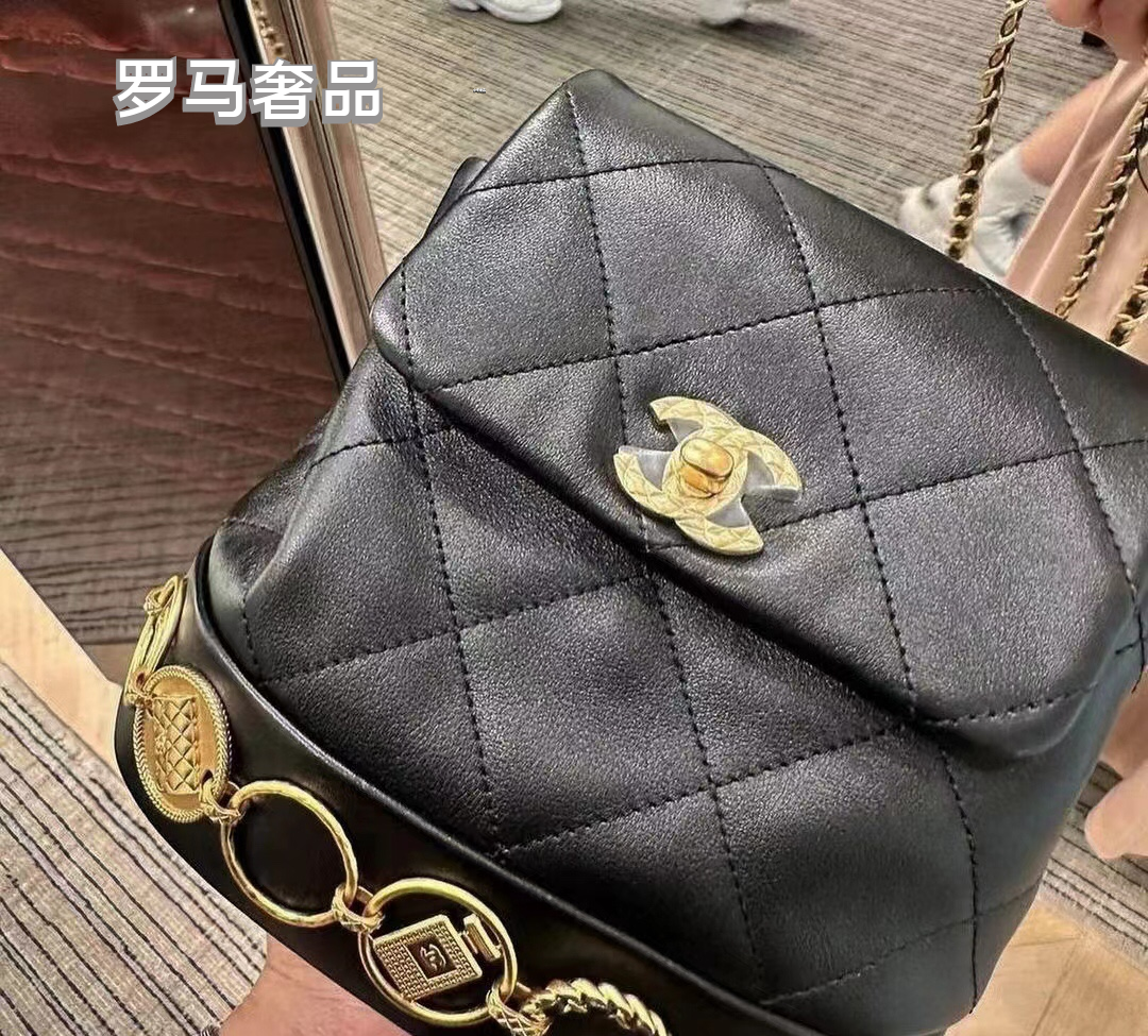 Chanel Vintage Mini Quilted Leather Backpack with Medallion Charm Chain Detail - Black/Gold