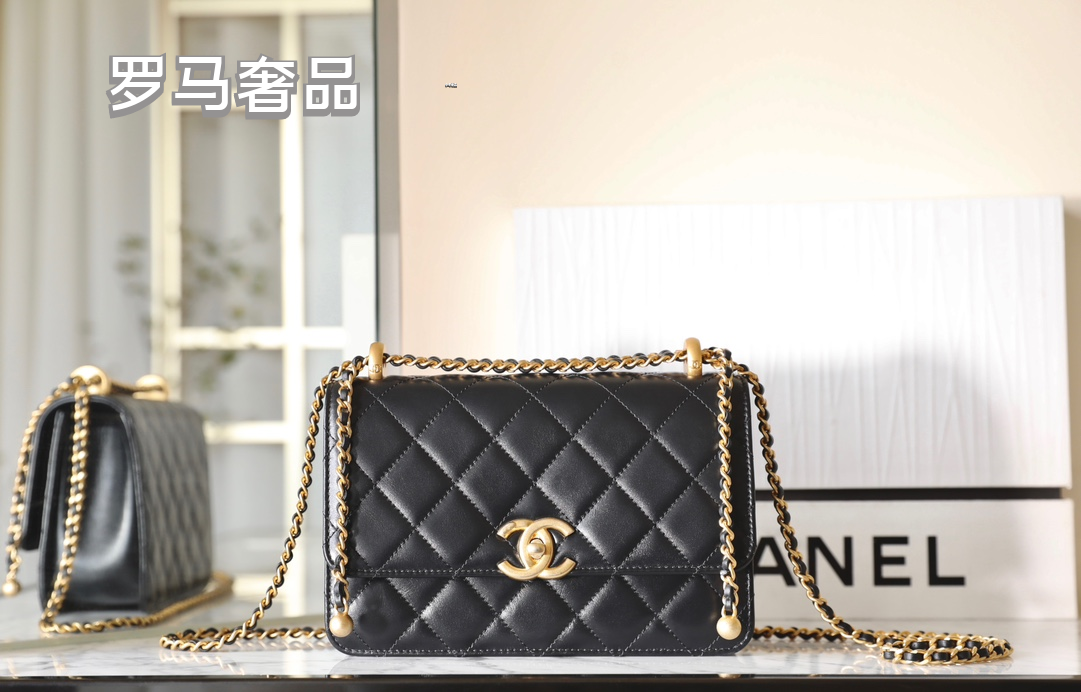 Chanel Black Quilted Lambskin Mini Flap Bag with Gold-Tone Hardware