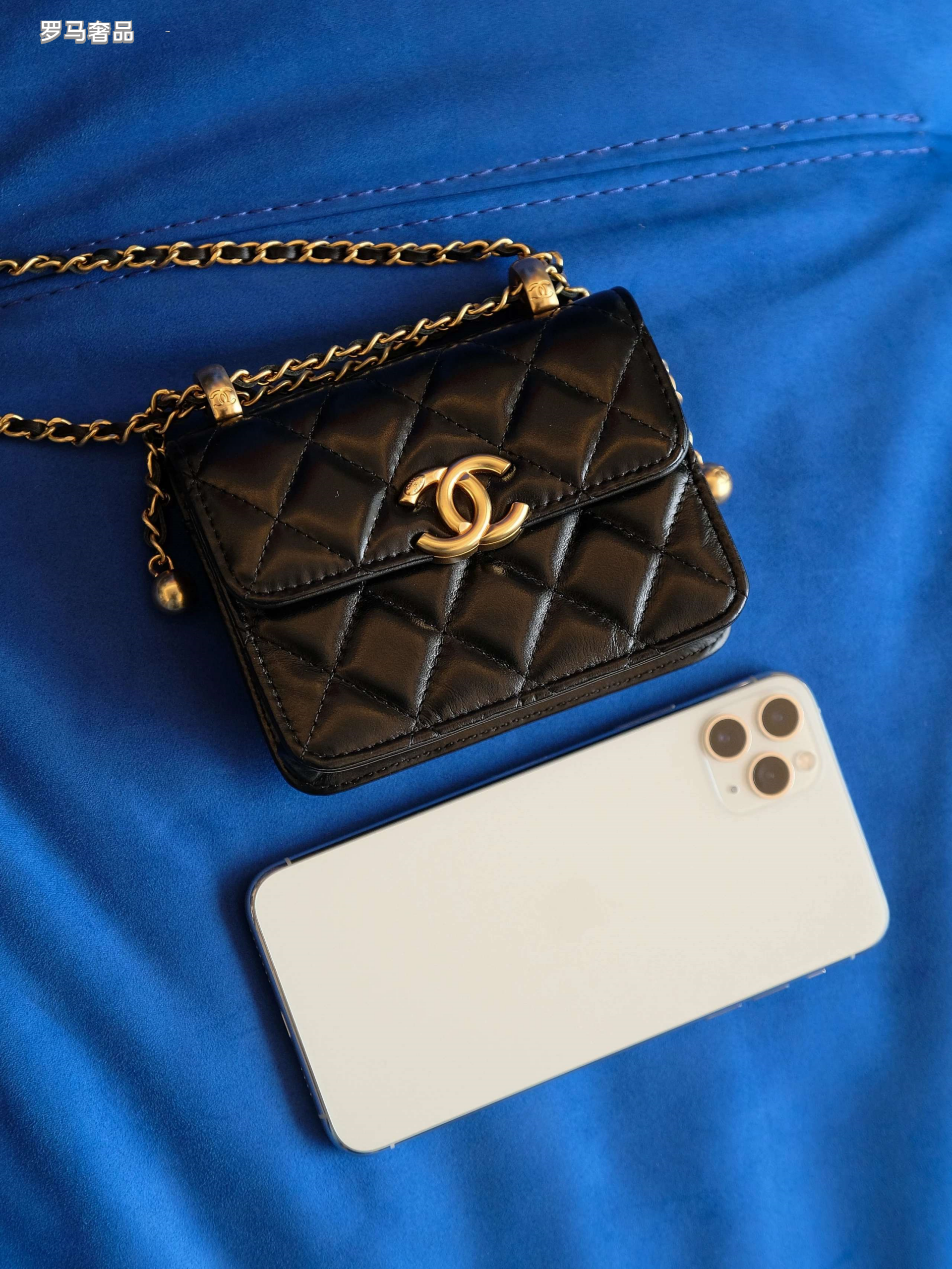 Chanel Mini Flap Bag with Top Handle Black Quilted Leather Gold Hardware