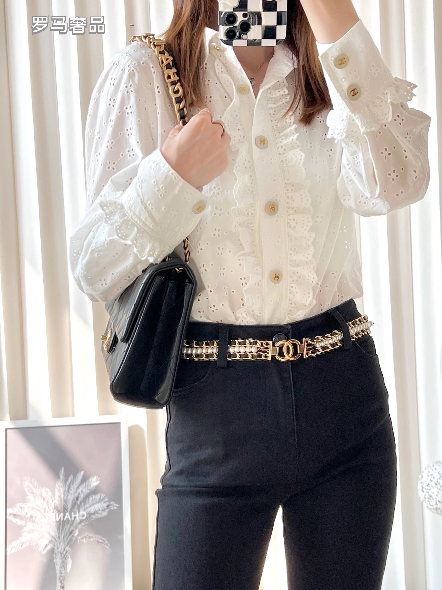 Chanel Black Quilted Lambskin Flap Bag with Gold-Tone Logo Chain