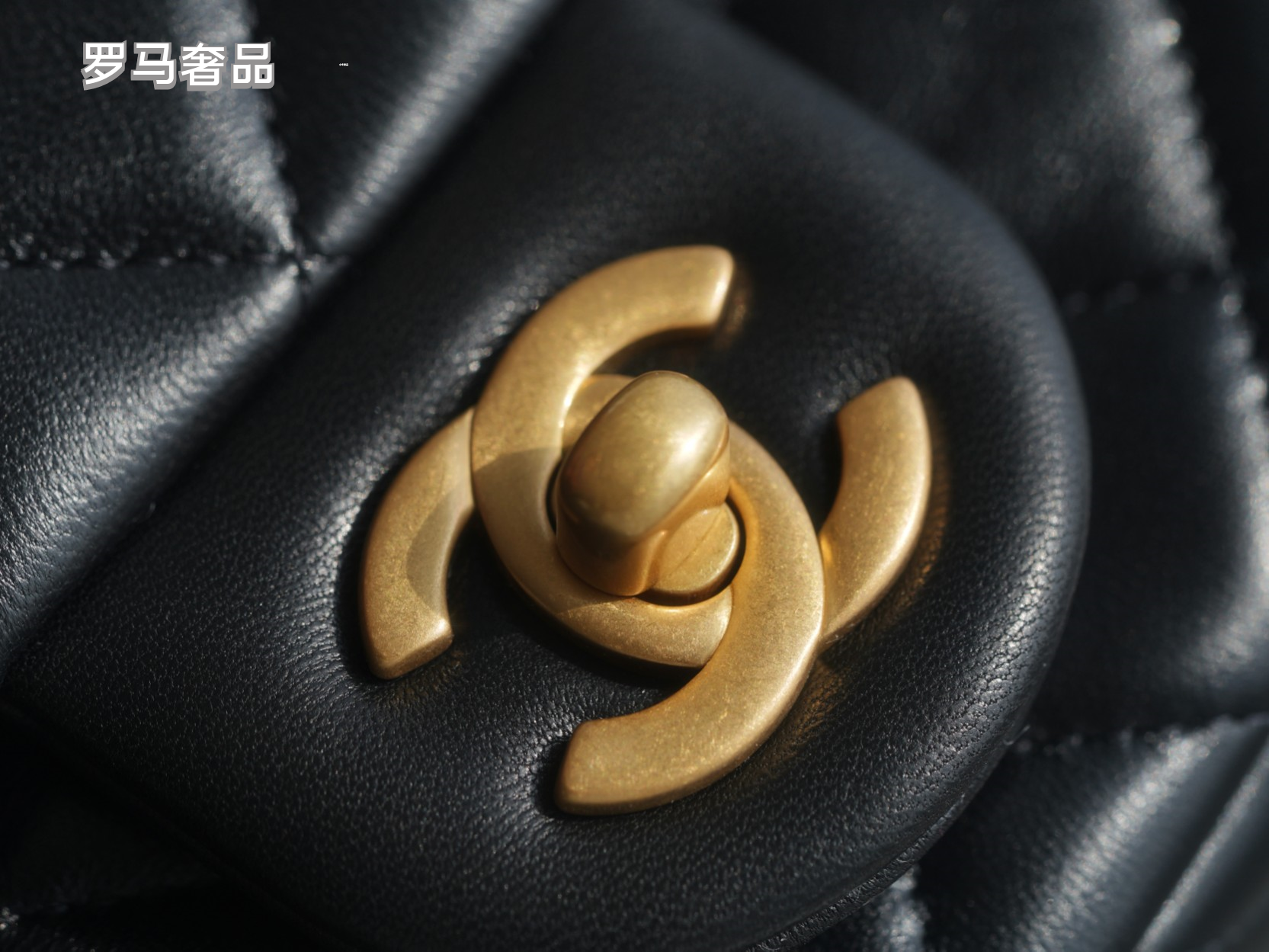 Luxury Quilted Black Leather Mini Flap Bag with Gold-Tone Chain and Ball Detail