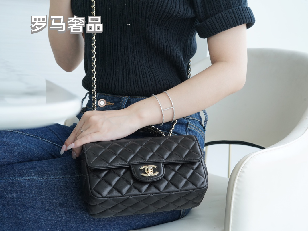 Elegant Black Quilted Leather Top Handle Flap Bag with Silver-Tone Chain