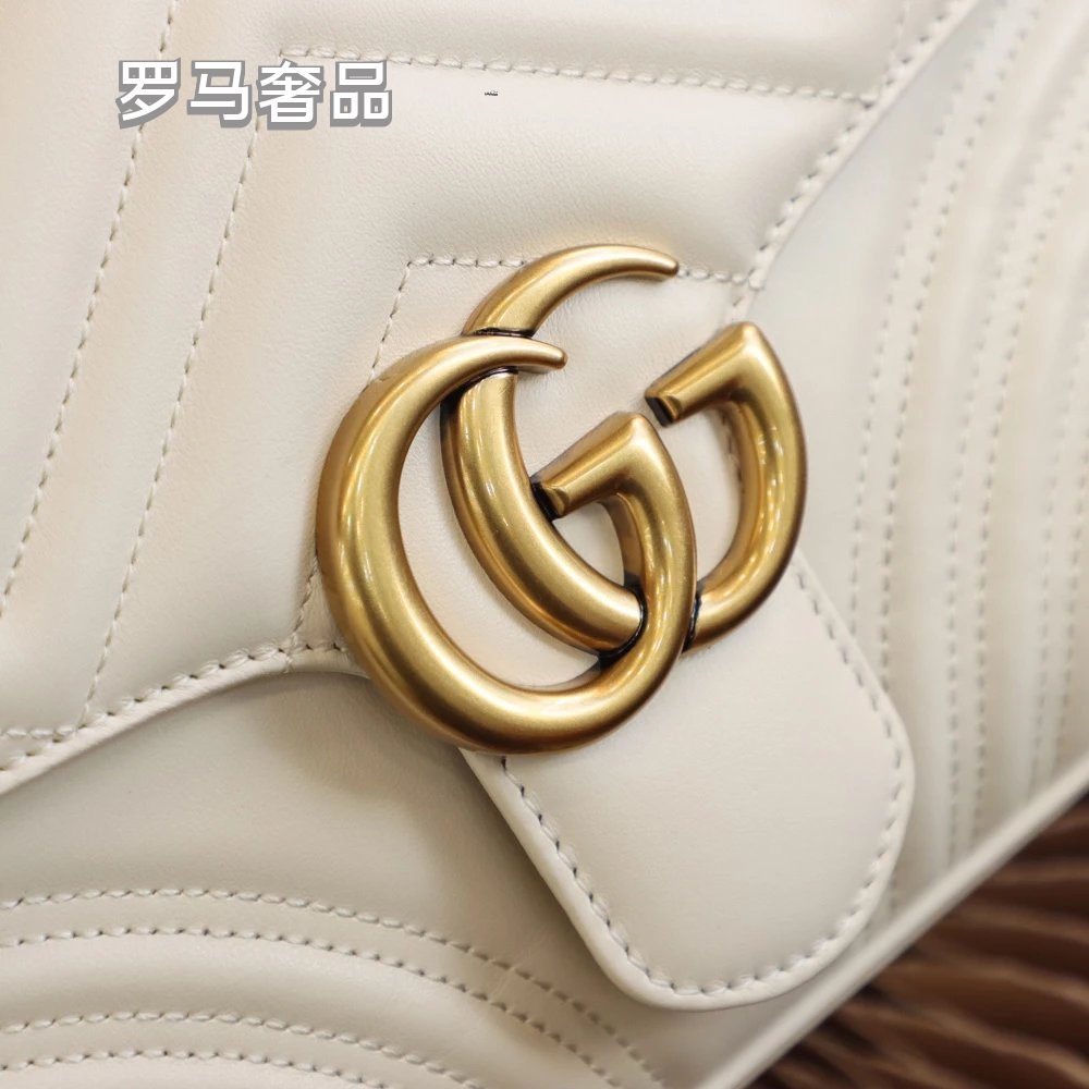 Gucci Elegant White Chevron Quilted Leather Handbag with Gold Hardware