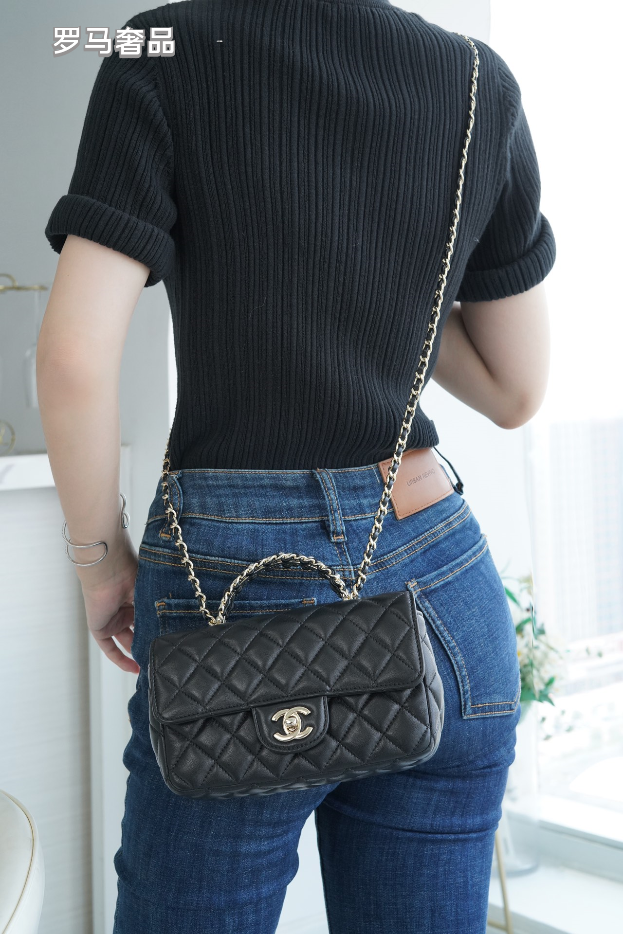 Elegant Black Quilted Leather Top Handle Flap Bag with Silver-Tone Chain