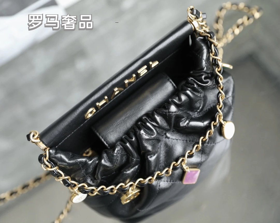 Chanel 22 Small Handbag Black Quilted Leather Gold-Tone Charms