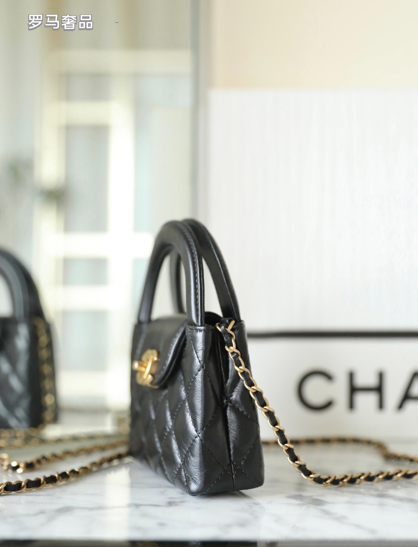Chanel Black Quilted Lambskin Mini Top Handle Bag Gold-Tone Hardware
