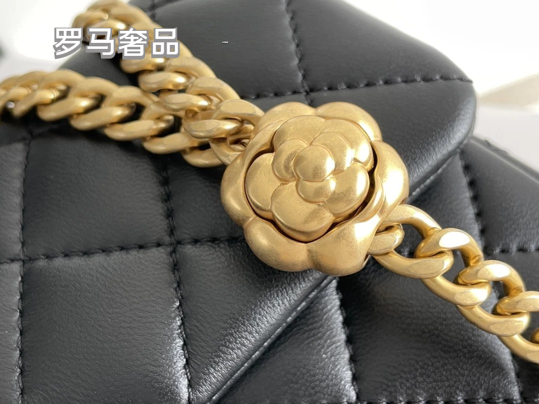 Black Quilted Leather Mini Flap Bag with Gold-Tone Chain and Camellia Charm