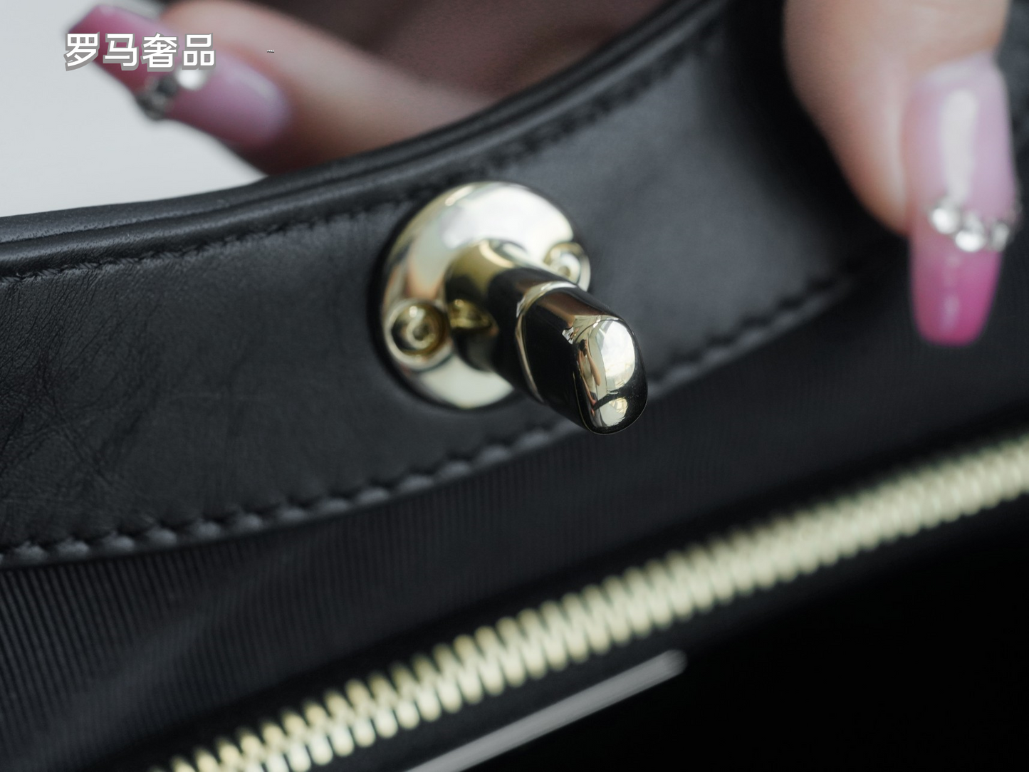 Luxury Black Quilted Leather Handbag with Gold-Tone Chain Strap and Cut-Out Handles
