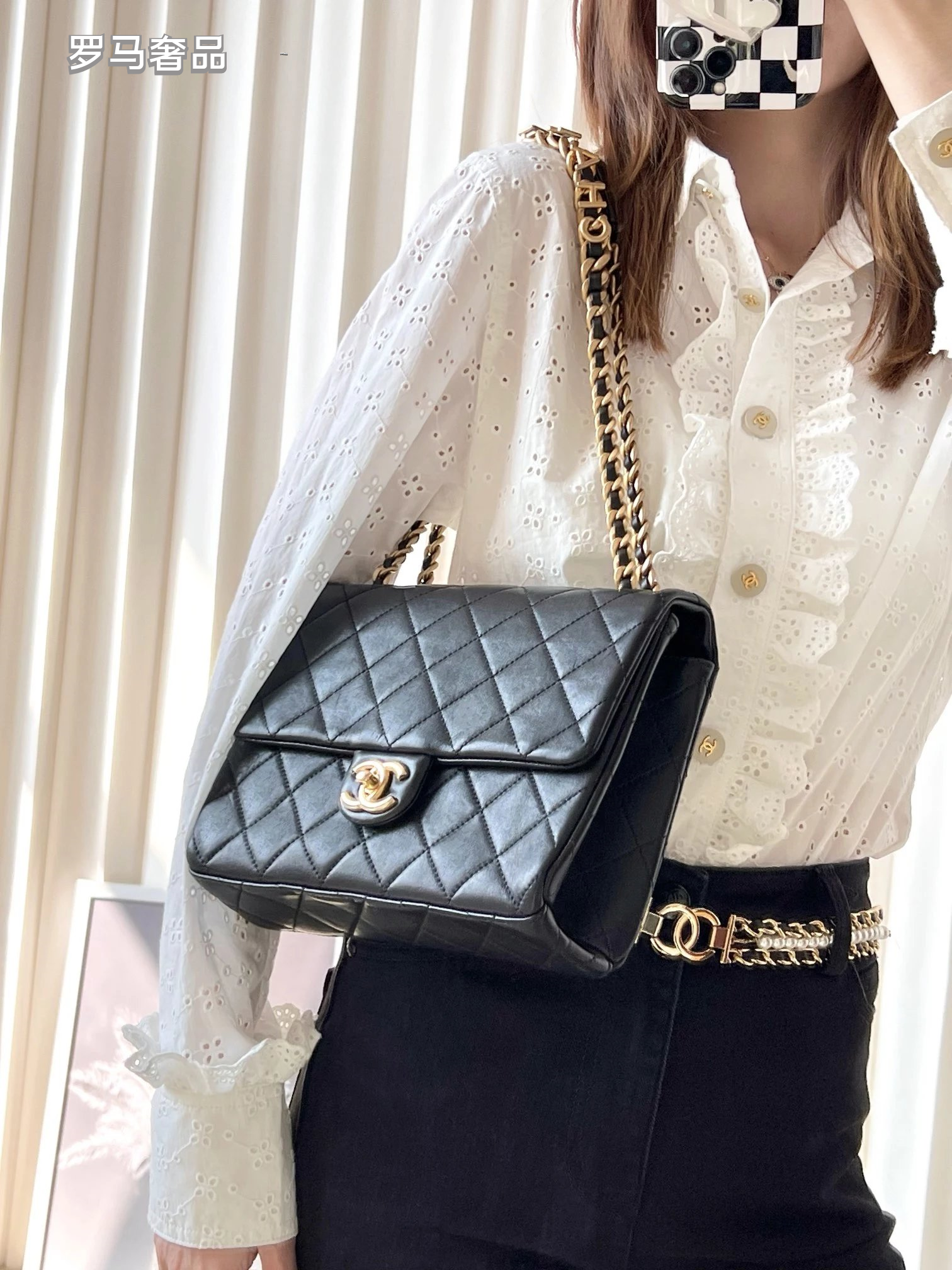 Chanel Black Quilted Lambskin Flap Bag with Gold-Tone Logo Chain