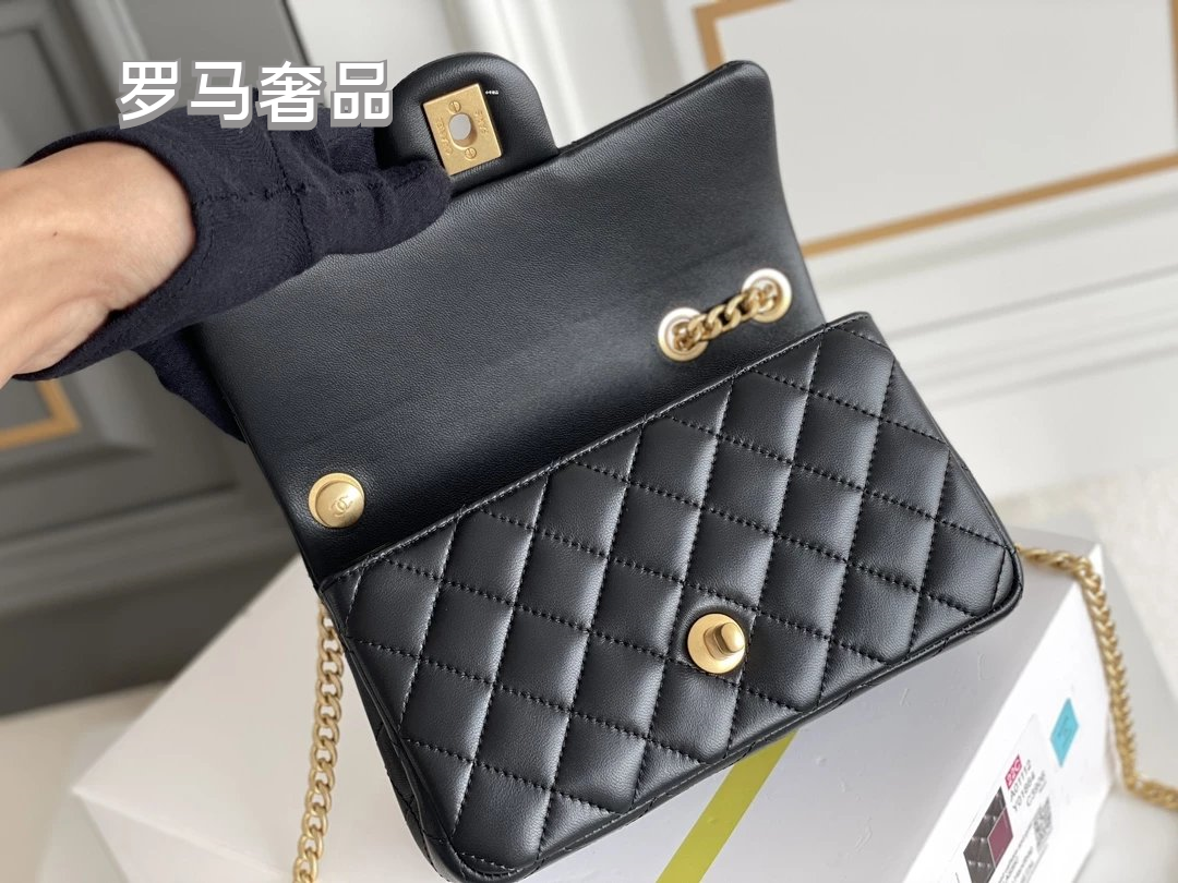 Black Quilted Leather Mini Flap Bag with Gold-Tone Chain and Camellia Charm