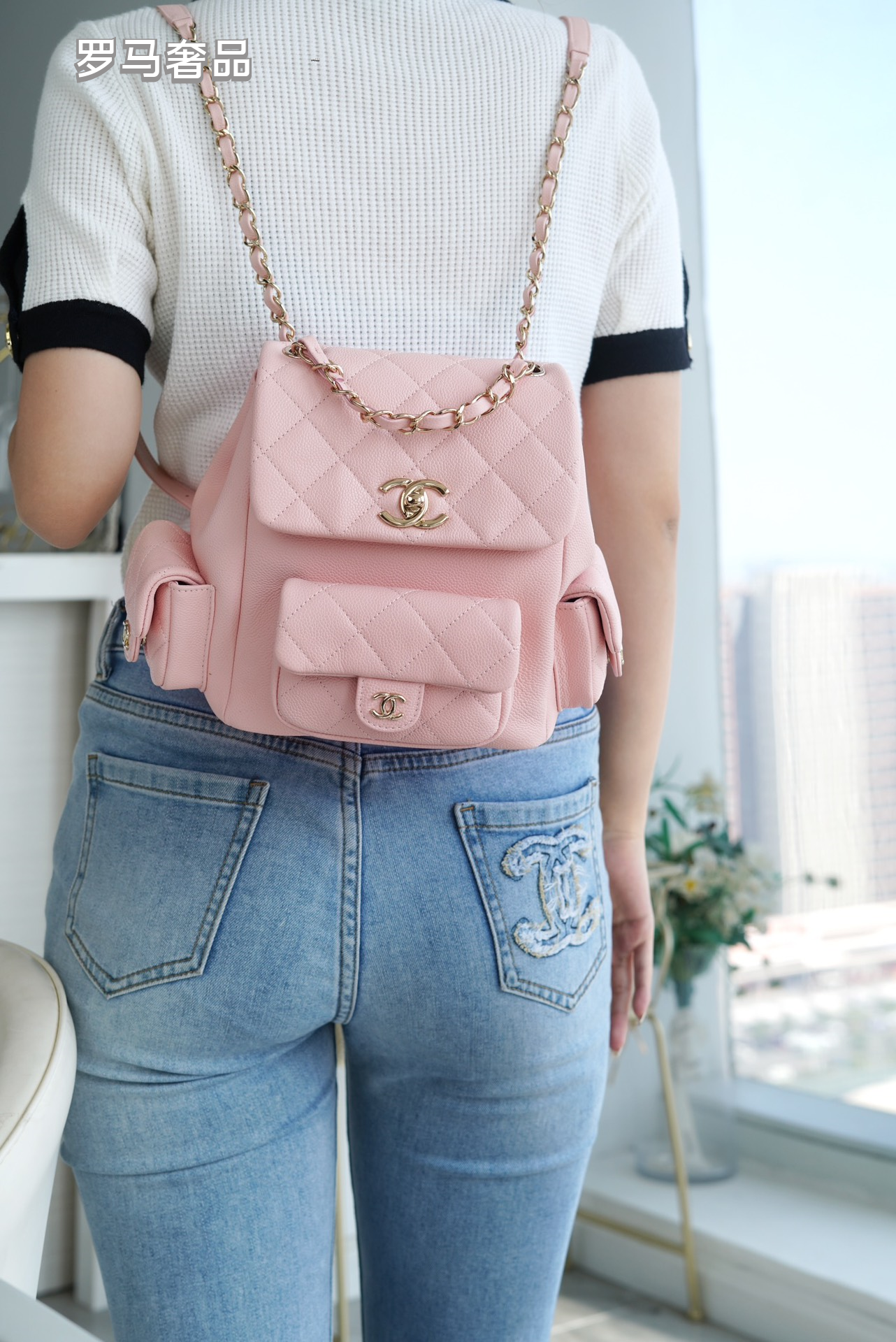 Chanel Quilted Pink Leather Backpack with Gold-Tone CC Logo