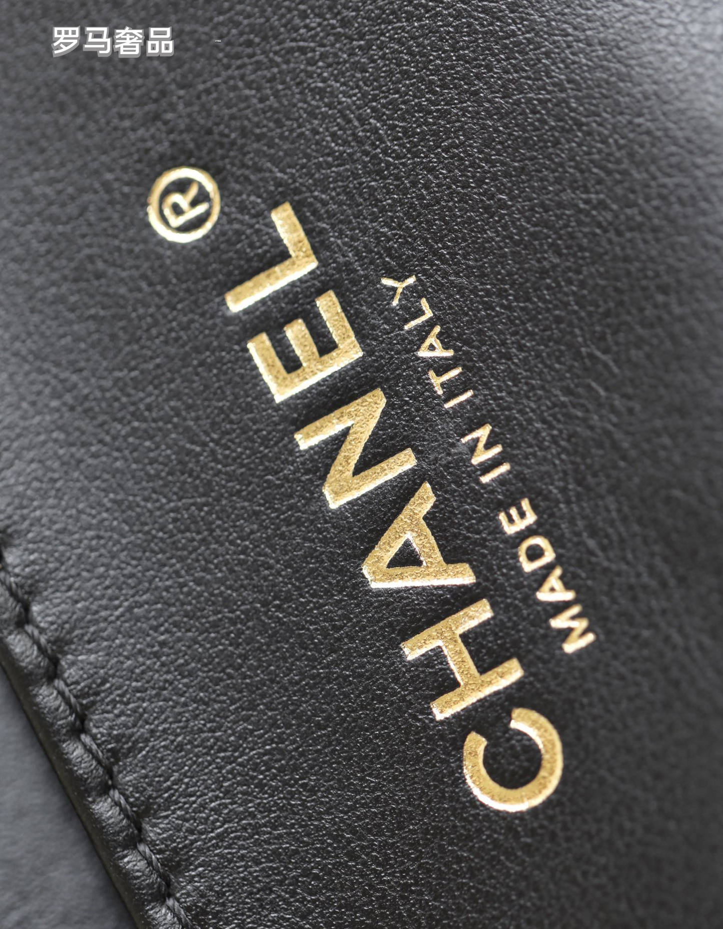 Chanel Black Quilted Lambskin Mini Flap Bag with Gold-Tone Hardware