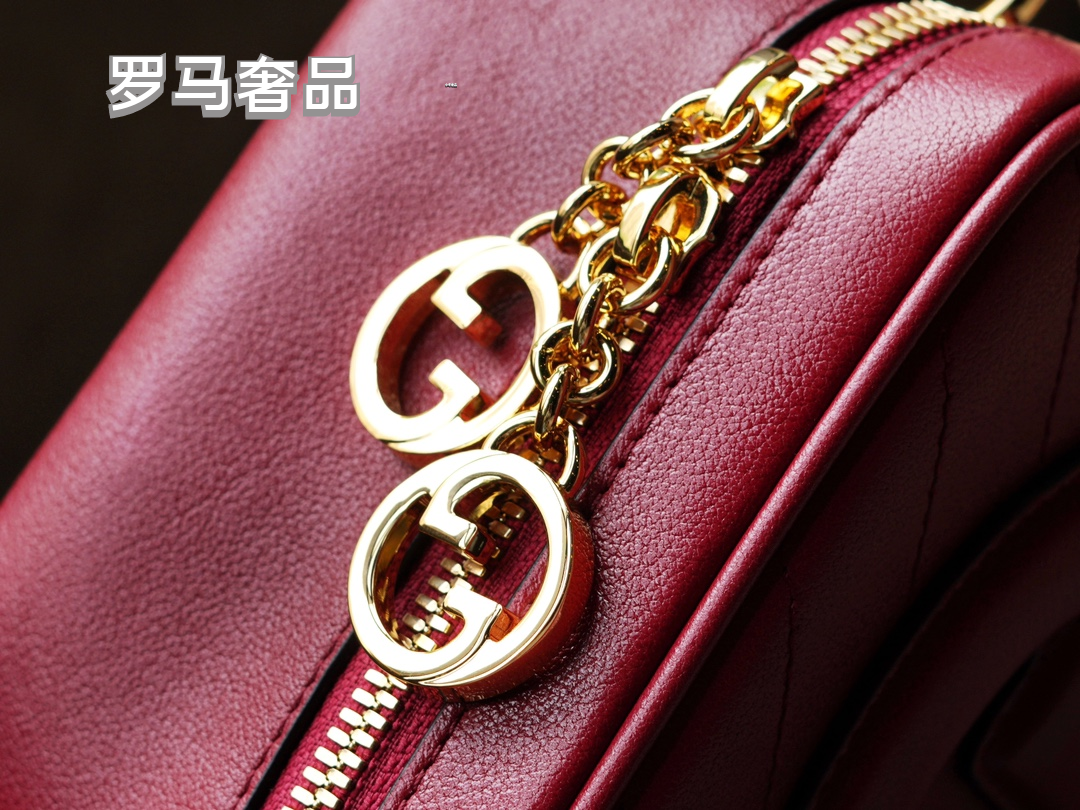 Gucci Red Leather Crossbody Camera Bag with Embossed Logo and Tassel
