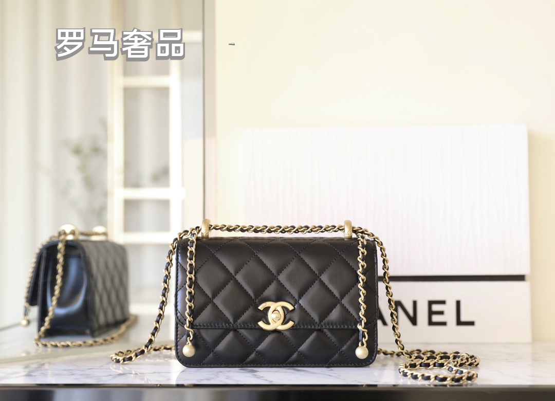 Chanel Black Quilted Lambskin Mini Flap Bag with Gold-Tone Hardware