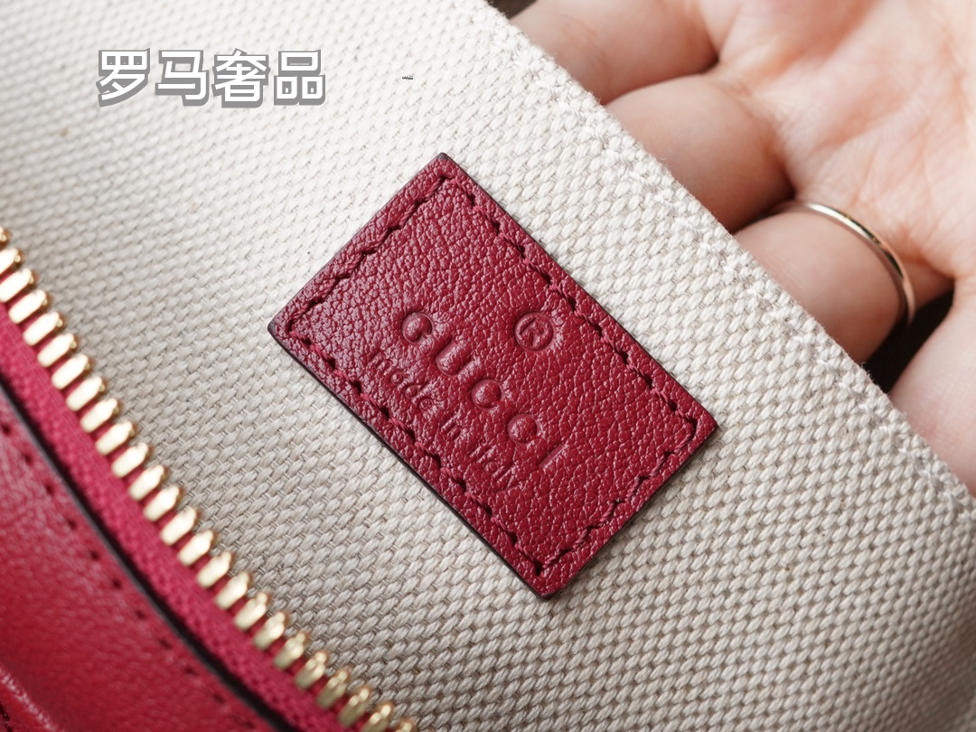Gucci Red Leather Crossbody Camera Bag with Embossed Logo and Tassel