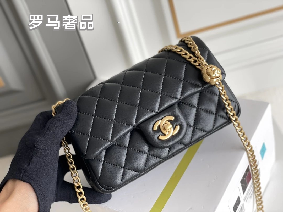 Black Quilted Leather Mini Flap Bag with Gold-Tone Chain and Camellia Charm