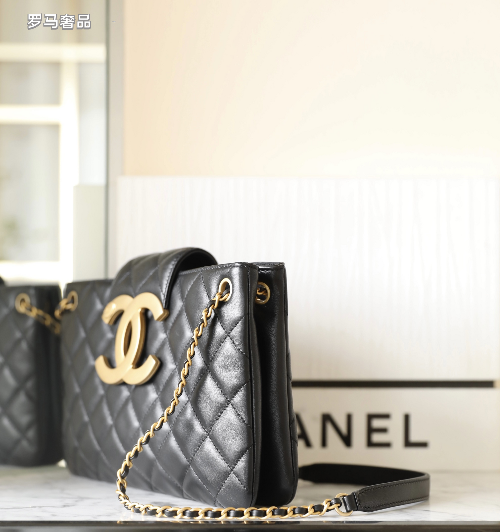 Chanel Black Quilted Leather Flap Bag with Large Gold CC Logo