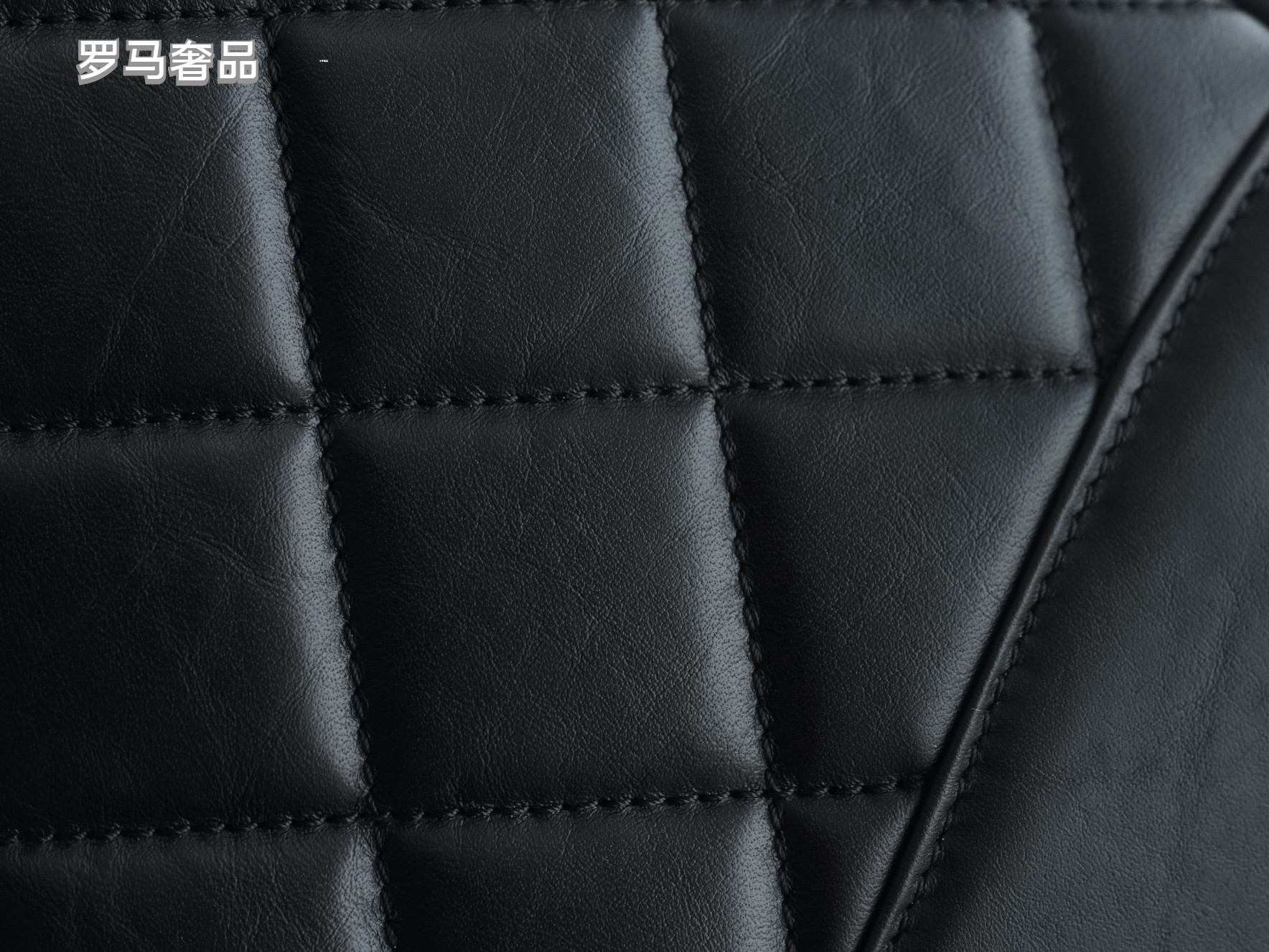 Luxury Black Quilted Leather Handbag with Gold-Tone Chain Strap and Cut-Out Handles