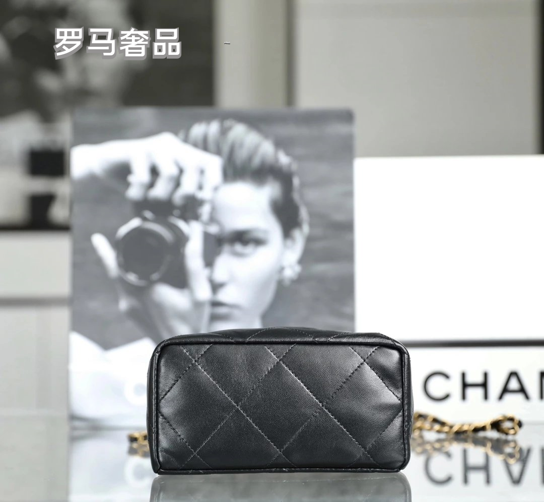 Chanel 22 Small Handbag Black Quilted Leather Gold-Tone Charms