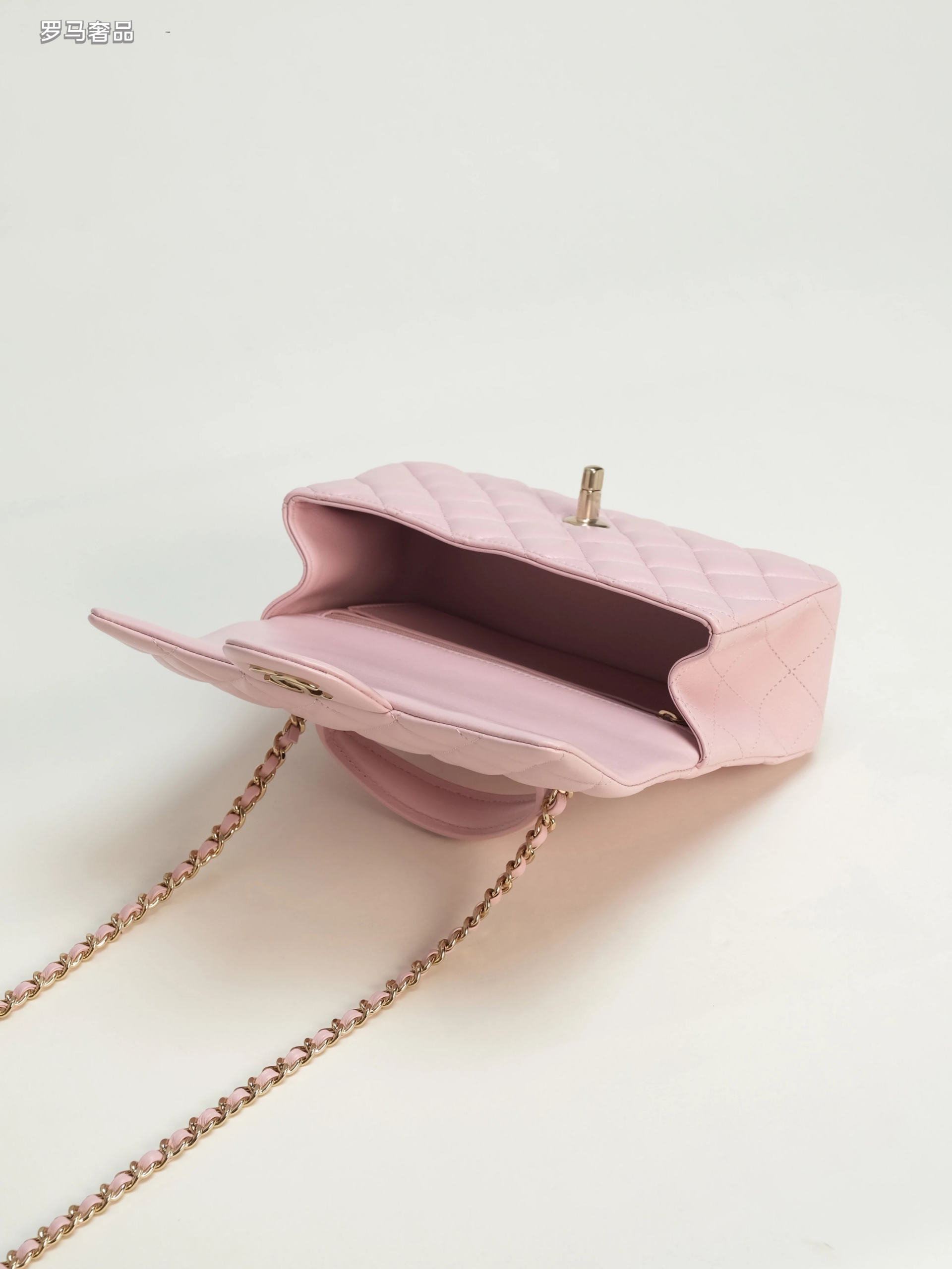 Pink Quilted Top Handle Handbag with Gold-Tone Chain Strap