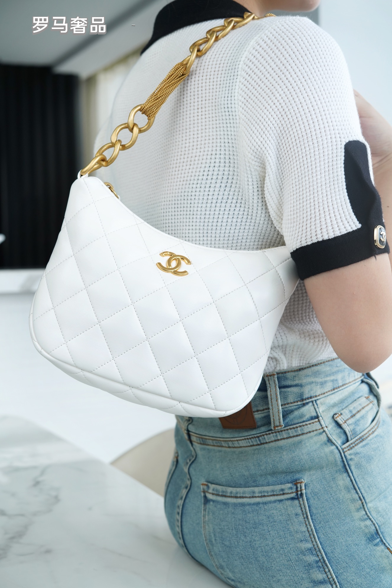 Chanel Quilted Black Leather Hobo Bag with Gold-Tone Chain Strap