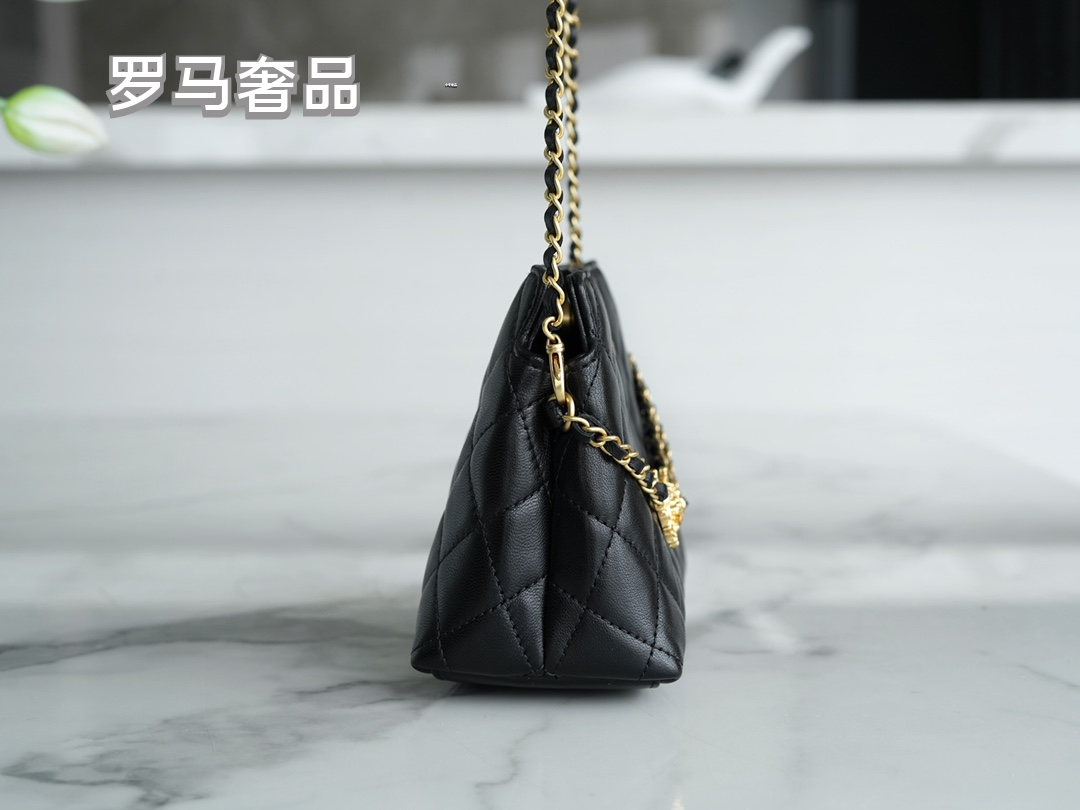 Chanel Black Quilted Leather Flap Bag with Lion Head Chain Embellishments