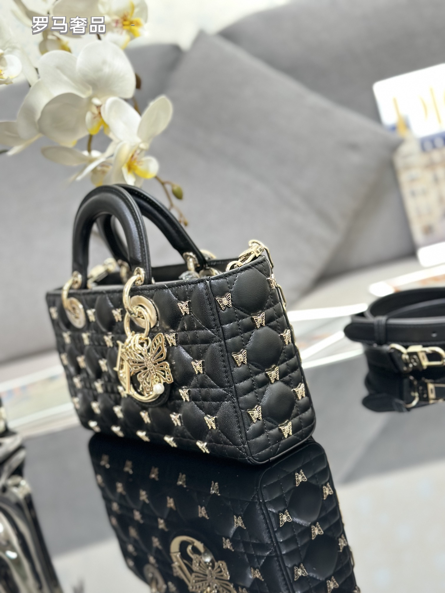 Dior Luxury Black Quilted Leather Top Handle Bag with Gold Butterfly Charm