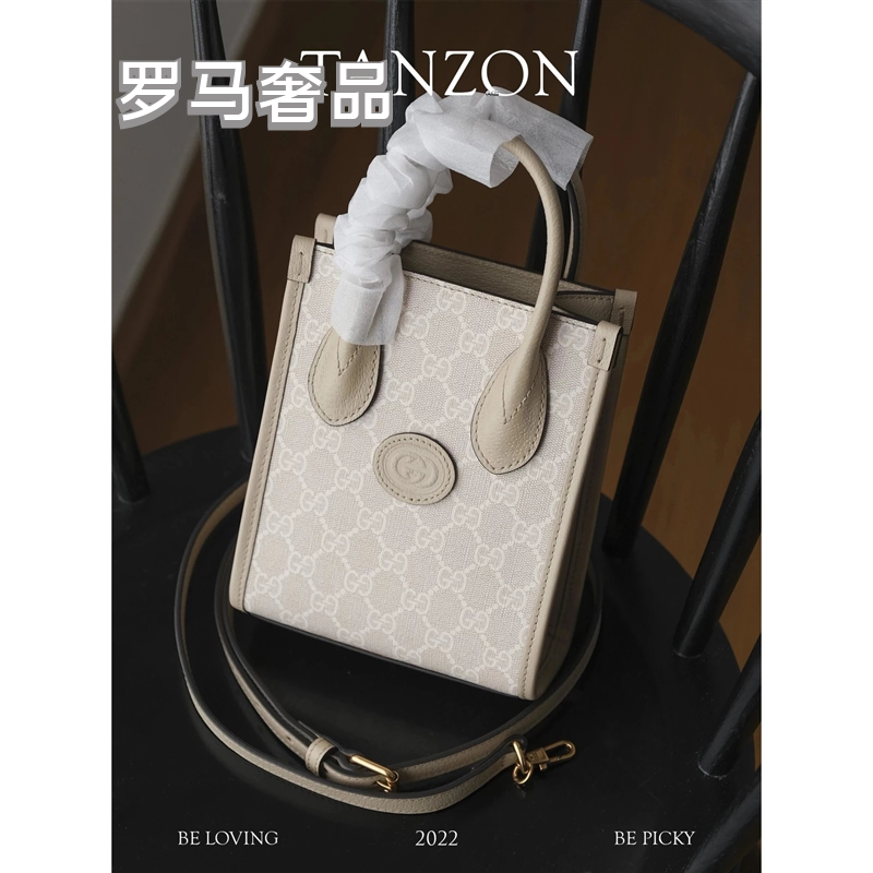 Gucci Elegant Cream Monogram Mini Tote Bag with Top Handles and Crossbody Strap