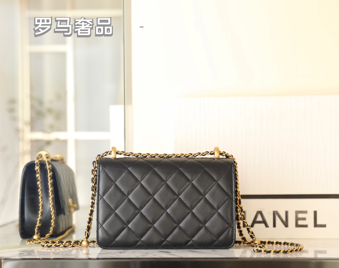 Chanel Black Quilted Lambskin Mini Flap Bag with Gold-Tone Hardware