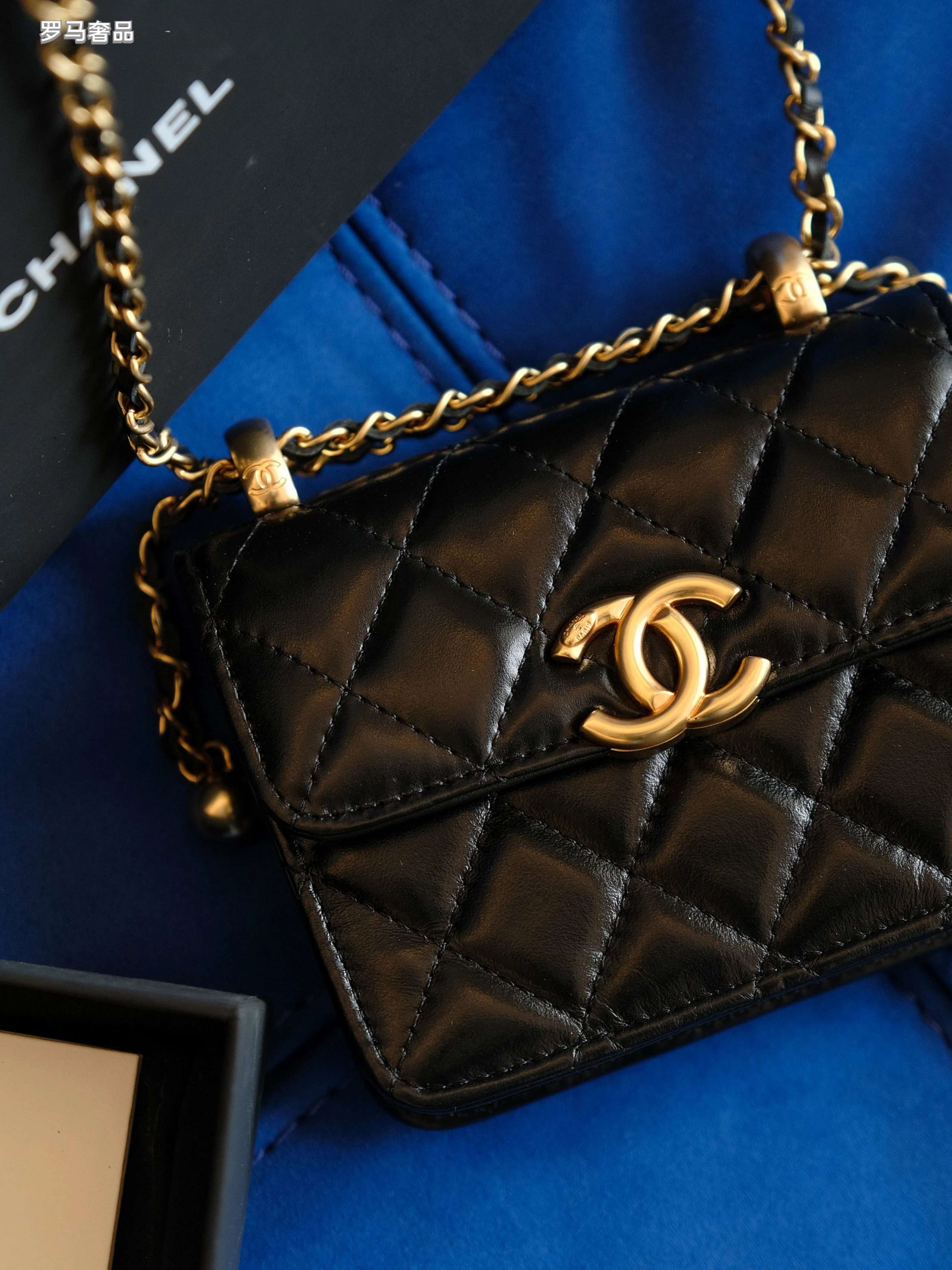 Chanel Mini Flap Bag with Top Handle Black Quilted Leather Gold Hardware