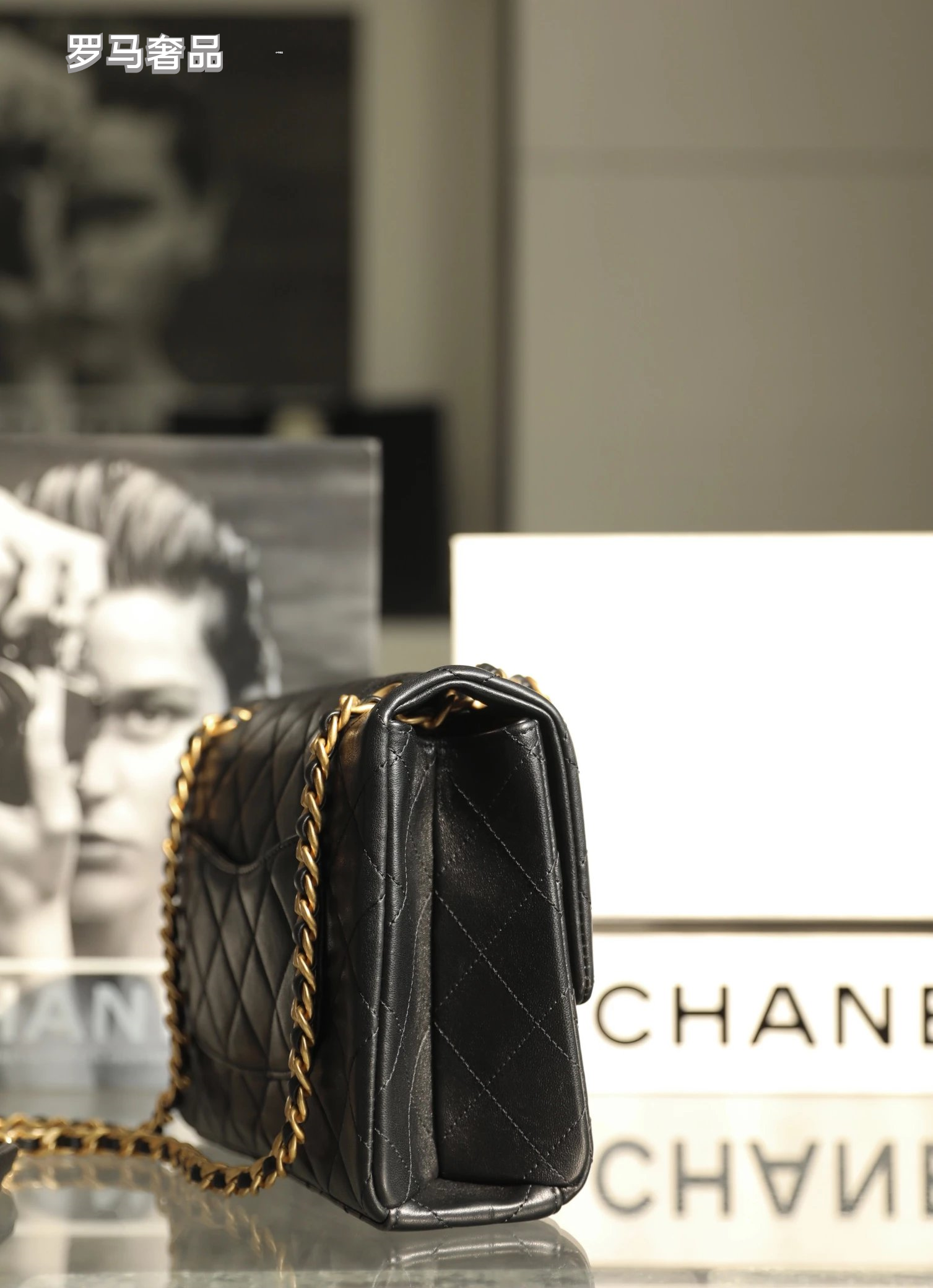 Chanel Black Quilted Lambskin Flap Bag with Gold-Tone Logo Chain