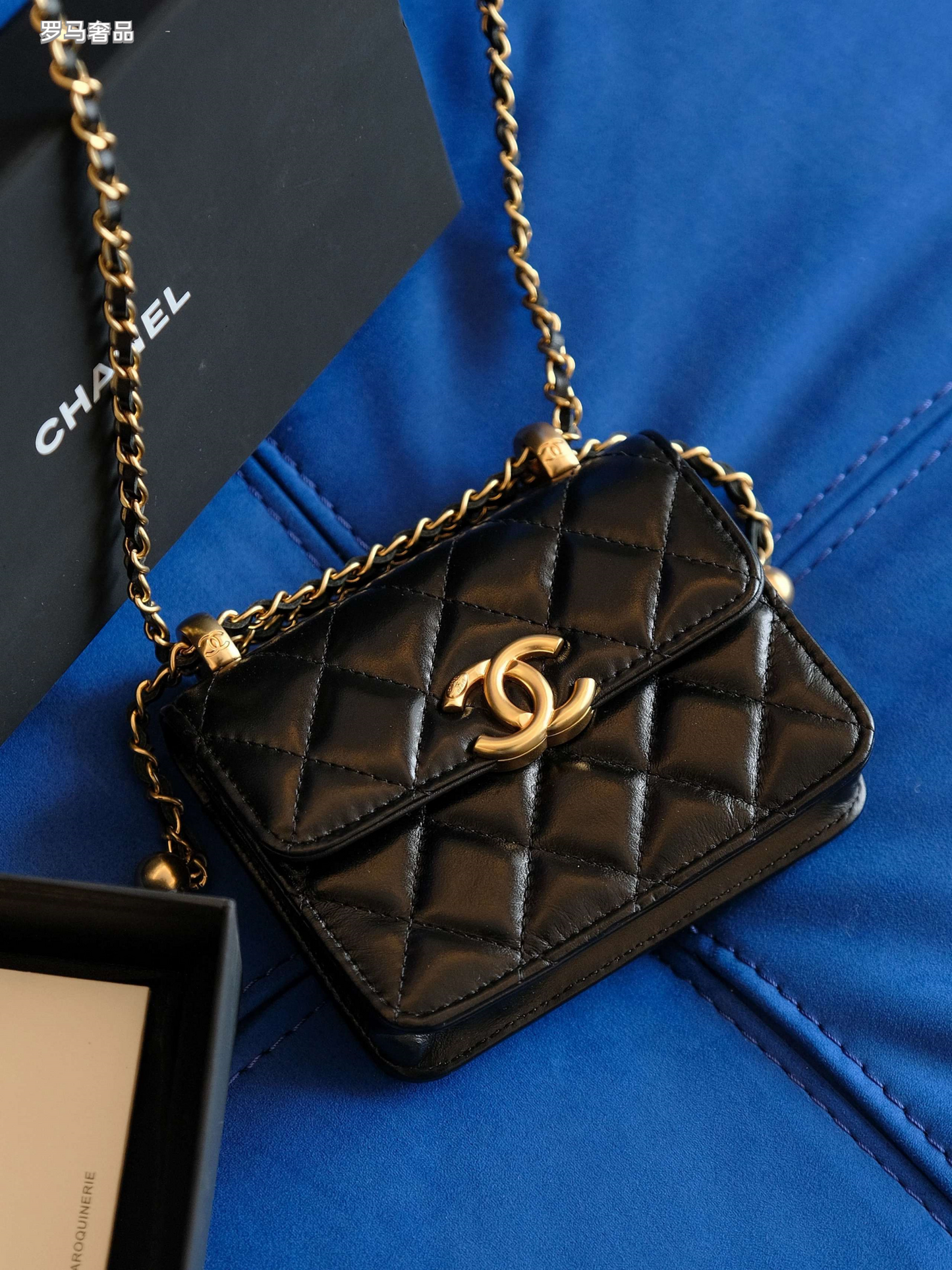 Chanel Mini Flap Bag with Top Handle Black Quilted Leather Gold Hardware