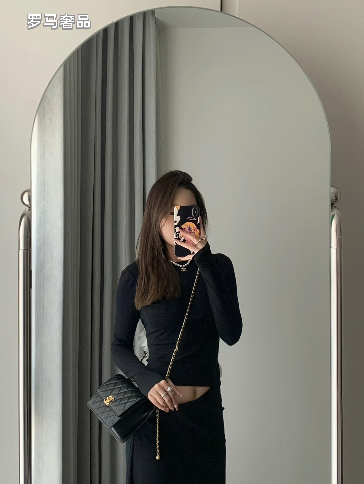 Chanel Black Quilted Lambskin Mini Flap Bag with Gold-Tone Hardware