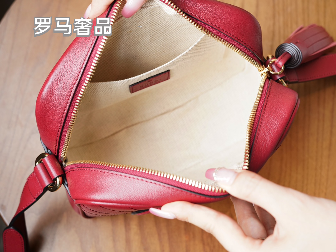 Gucci Red Leather Crossbody Camera Bag with Embossed Logo and Tassel