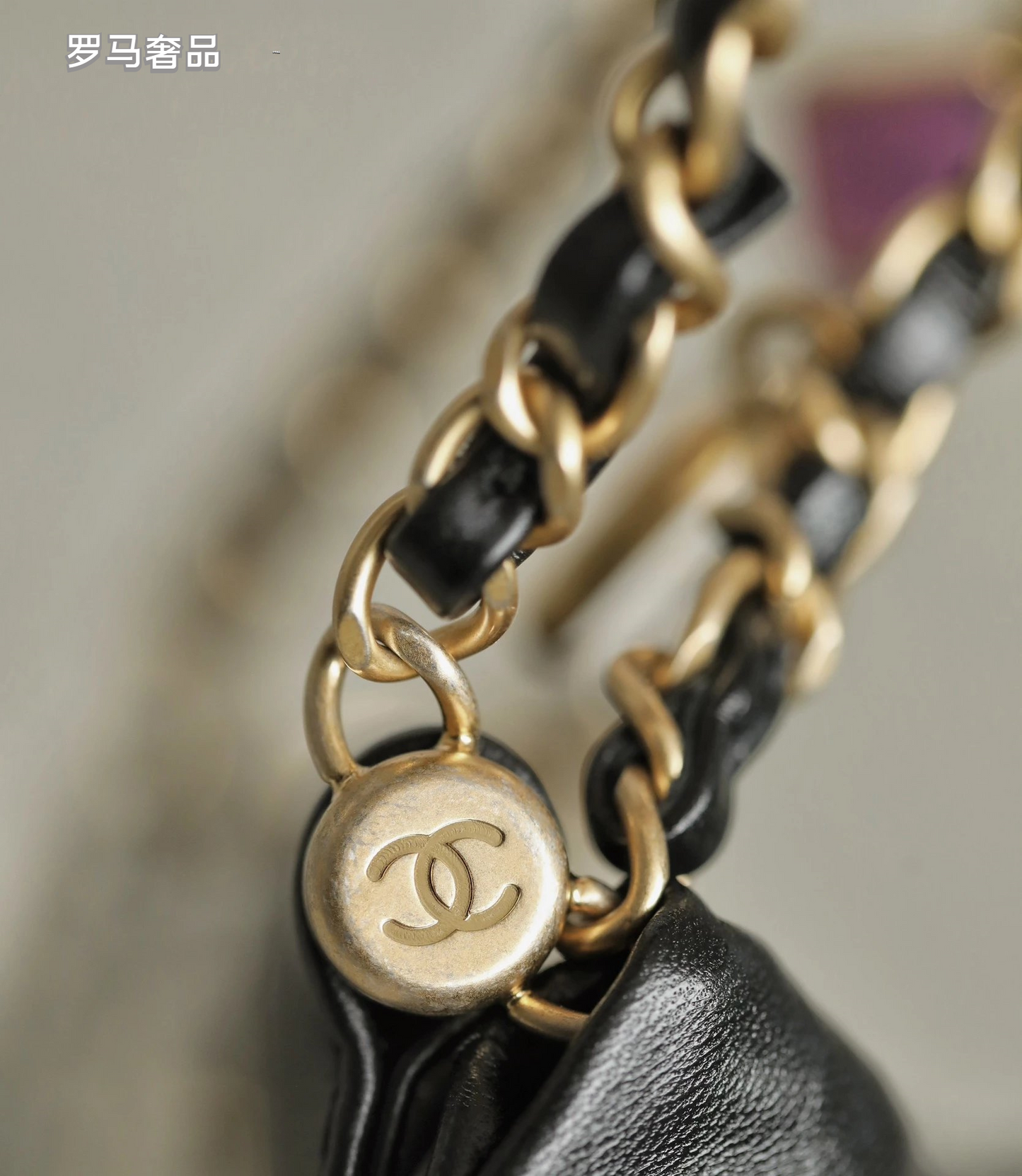 Chanel 22 Small Handbag Black Quilted Leather Gold-Tone Charms