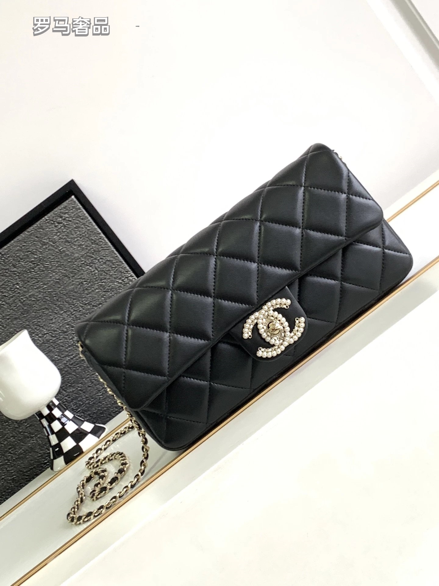 Black Quilted Leather Flap Bag with Crystal Interlocking Logo and Chain Strap